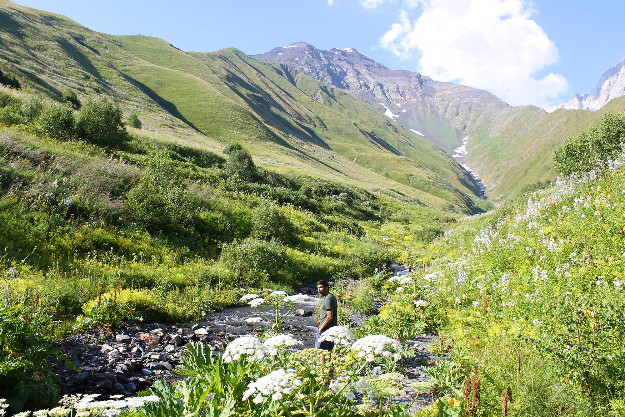 The water coming down from the glacier is ice cold - even in August - Balti had to test it with his own feet