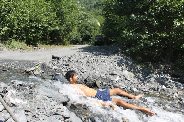 A couple of streams erode the road to Ushguli