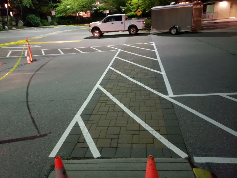 Line painting a customer walkway for retail - Northstar Line Painting