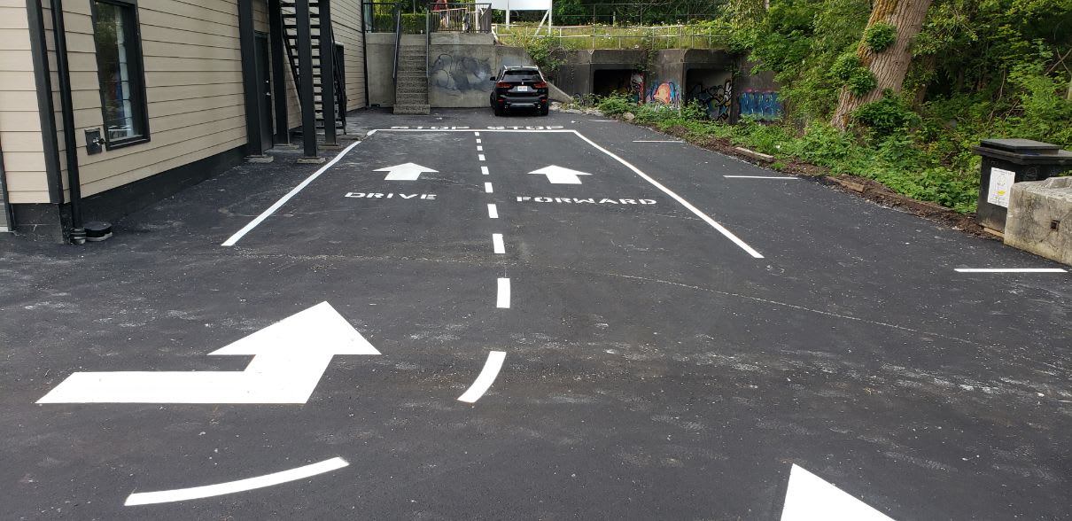 Enterprise parking line paint project 3 Directional arrows painted