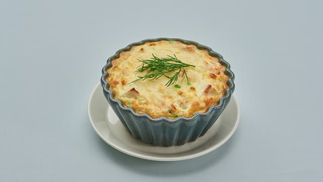 Ostegratinert fiskepudding