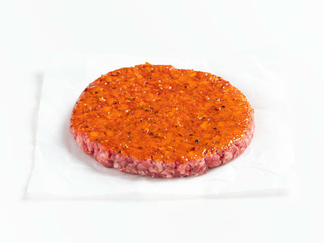 **Chiliburger:** Pensle hamburgerne med ghost chili glaze. Grill eller stek burgerne til de er gylne på begge sider.