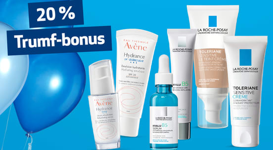 Et utvalg kremer fra La Roche Posay og Avéne som står oppstilt på en blå bakgrunn