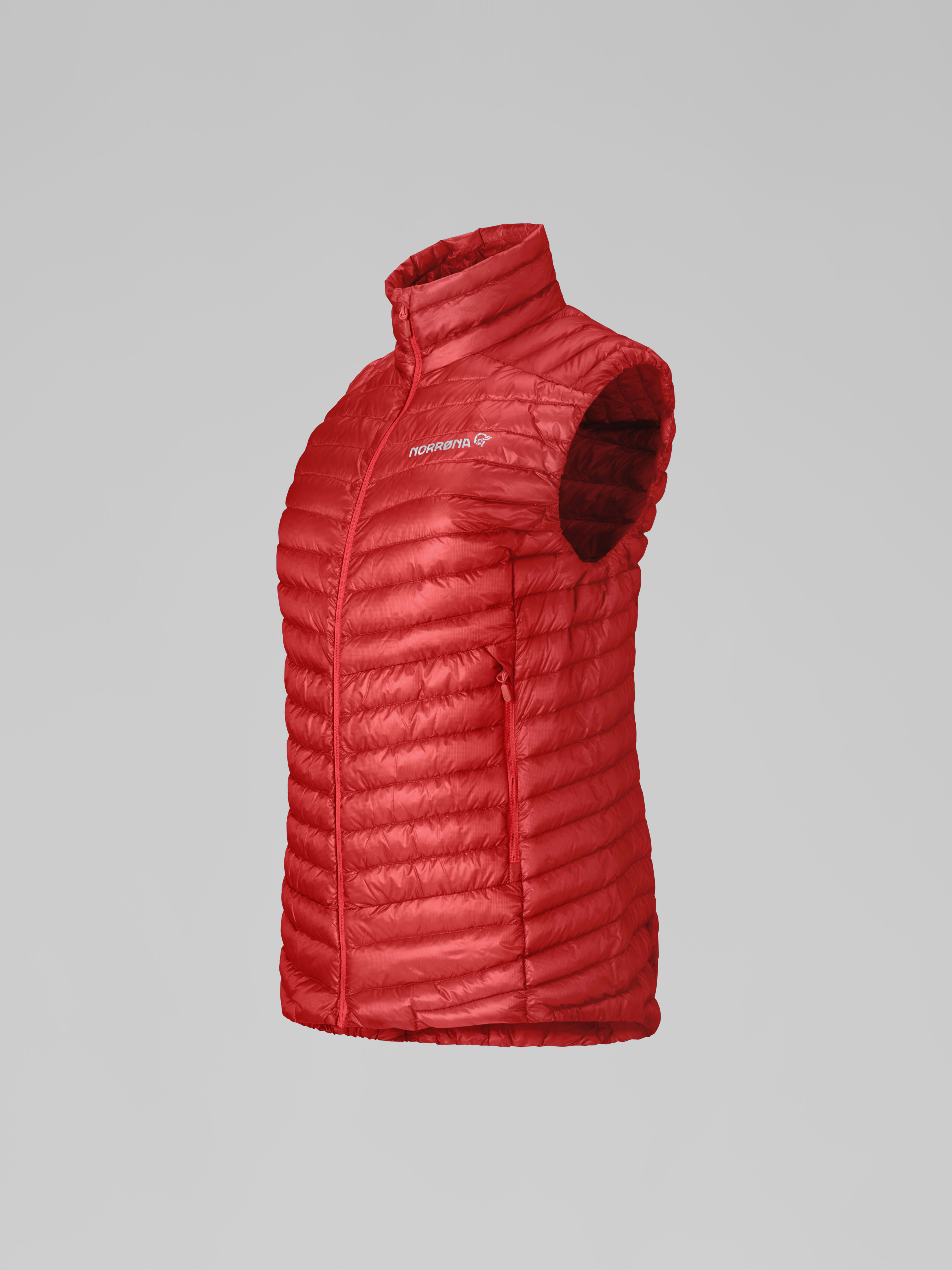 Packshot front left image of trollveggen down800 super light Vest Baked Apple
