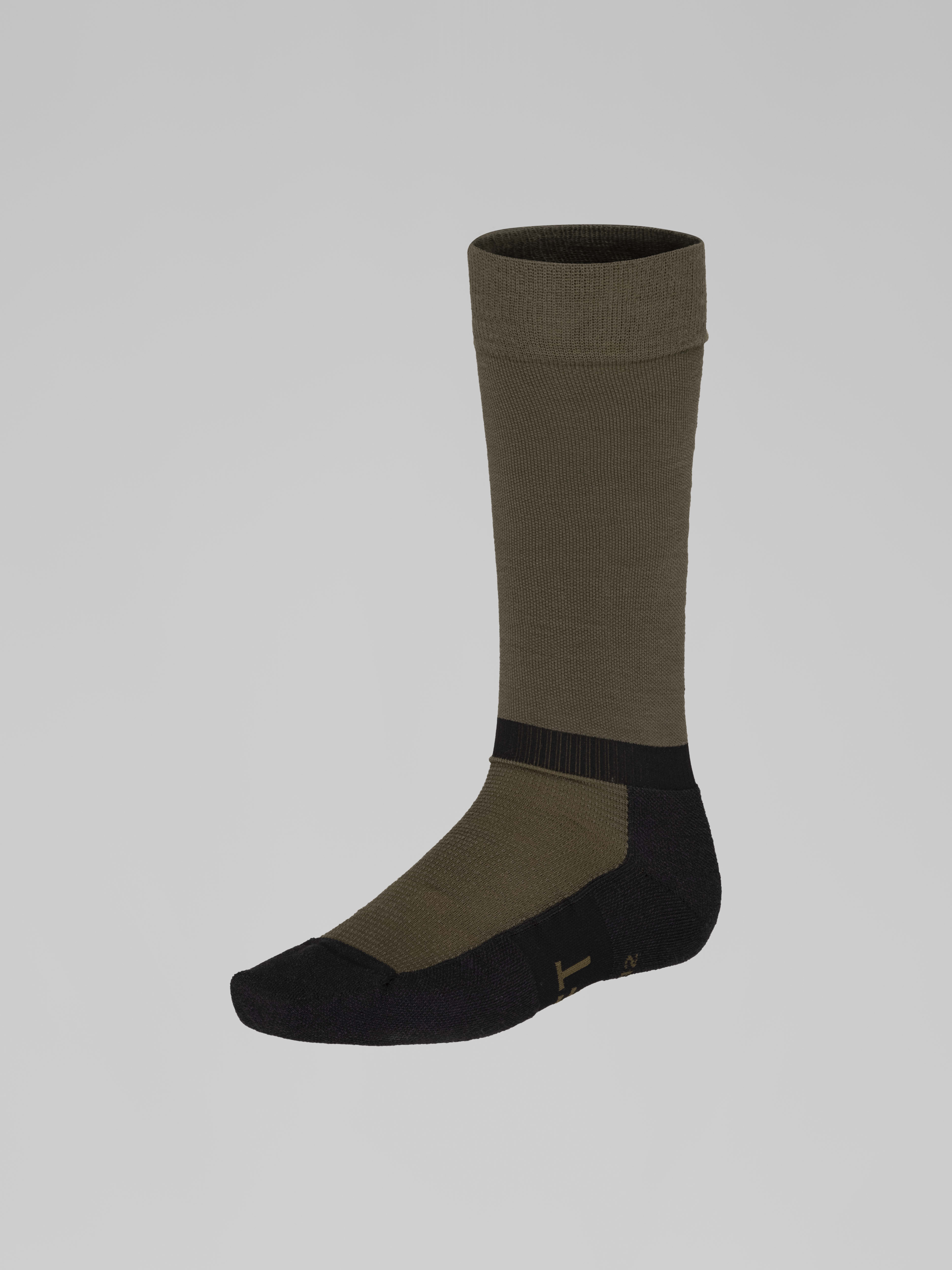 Packshot front image of senja light merinoUll long Socks Olive Night