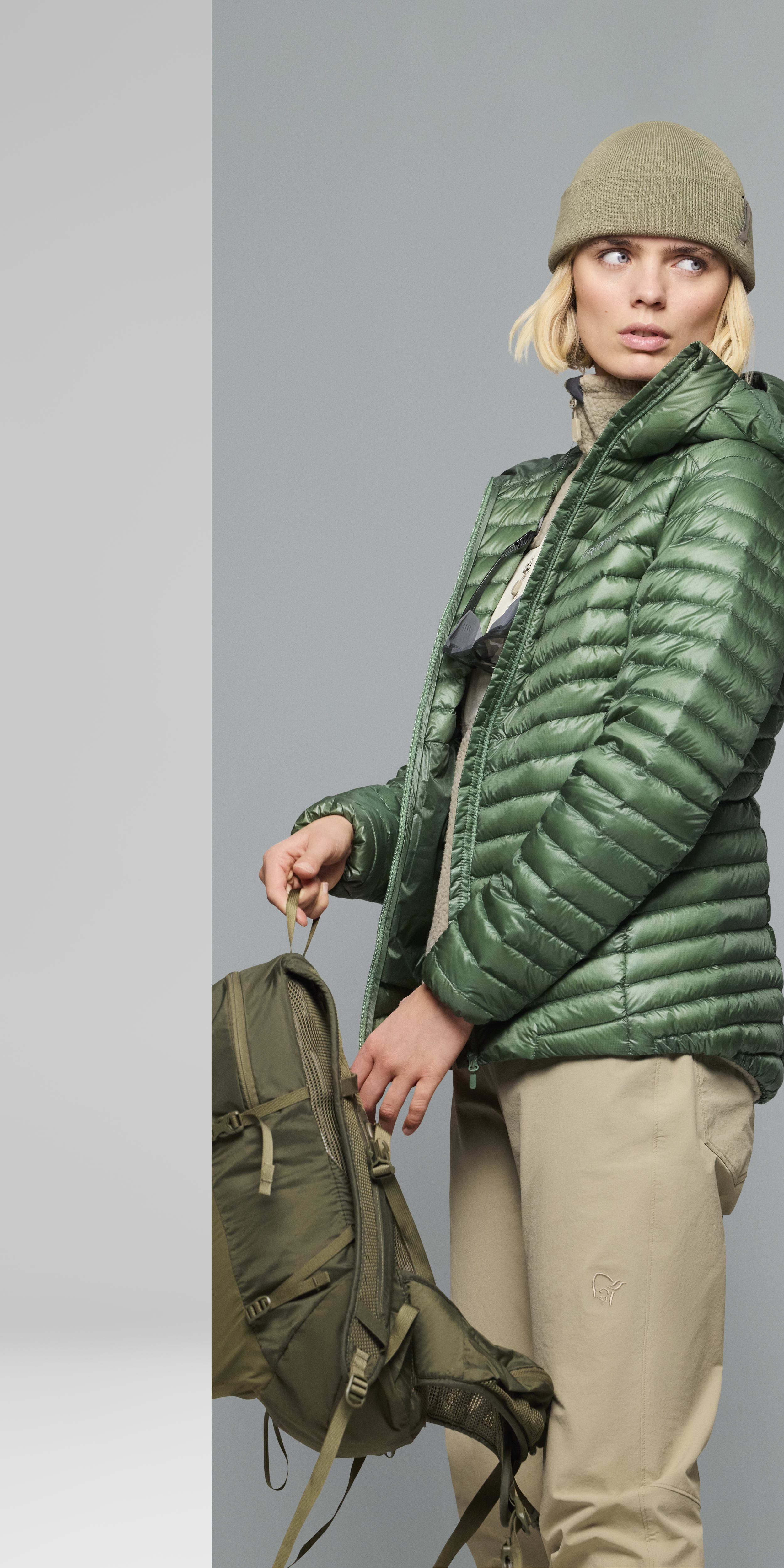 Female Look back image of 29 equaliser Beanie Deep Lichen Green