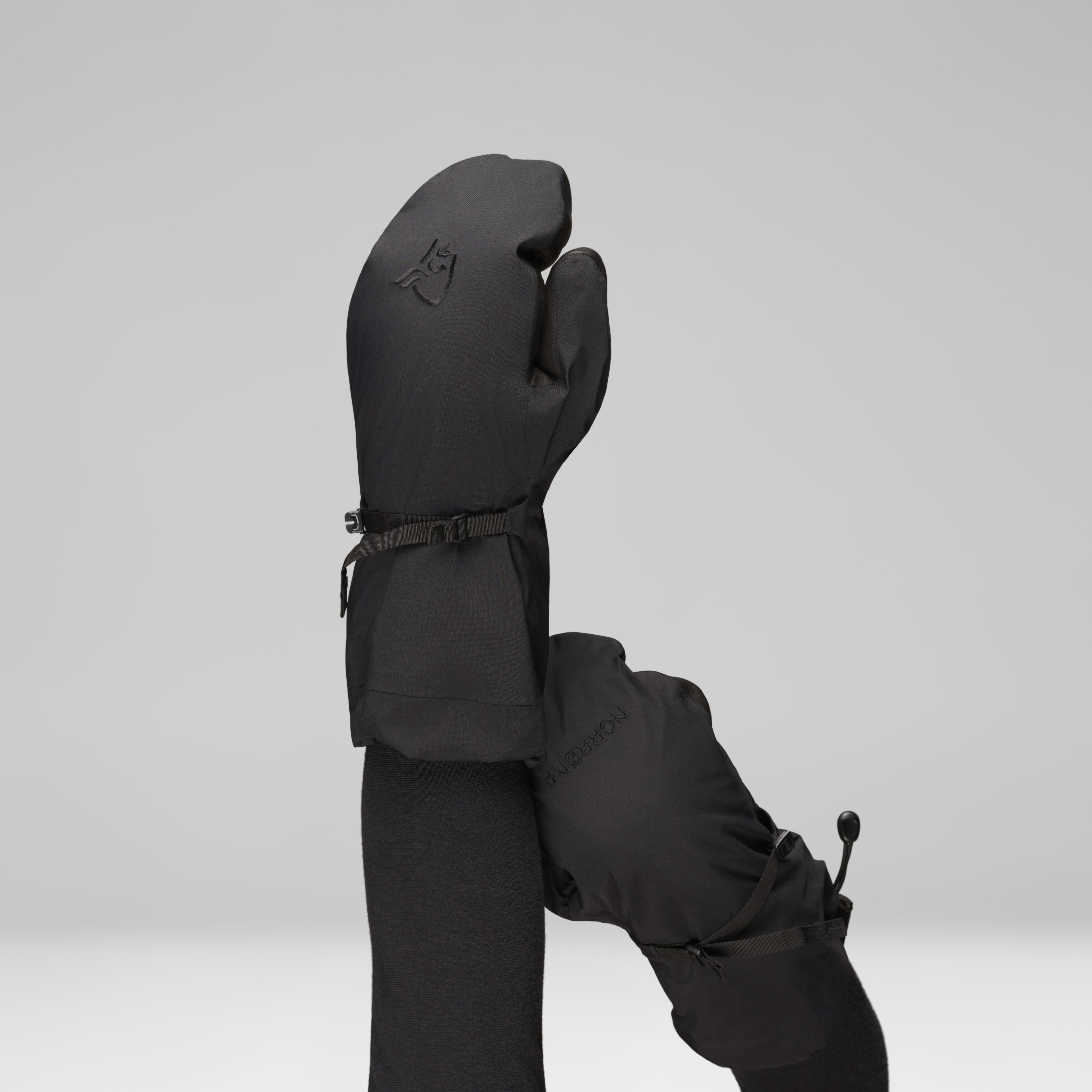 Female Look back image of trollveggen Gore-Tex Pro Mittens Caviar Black