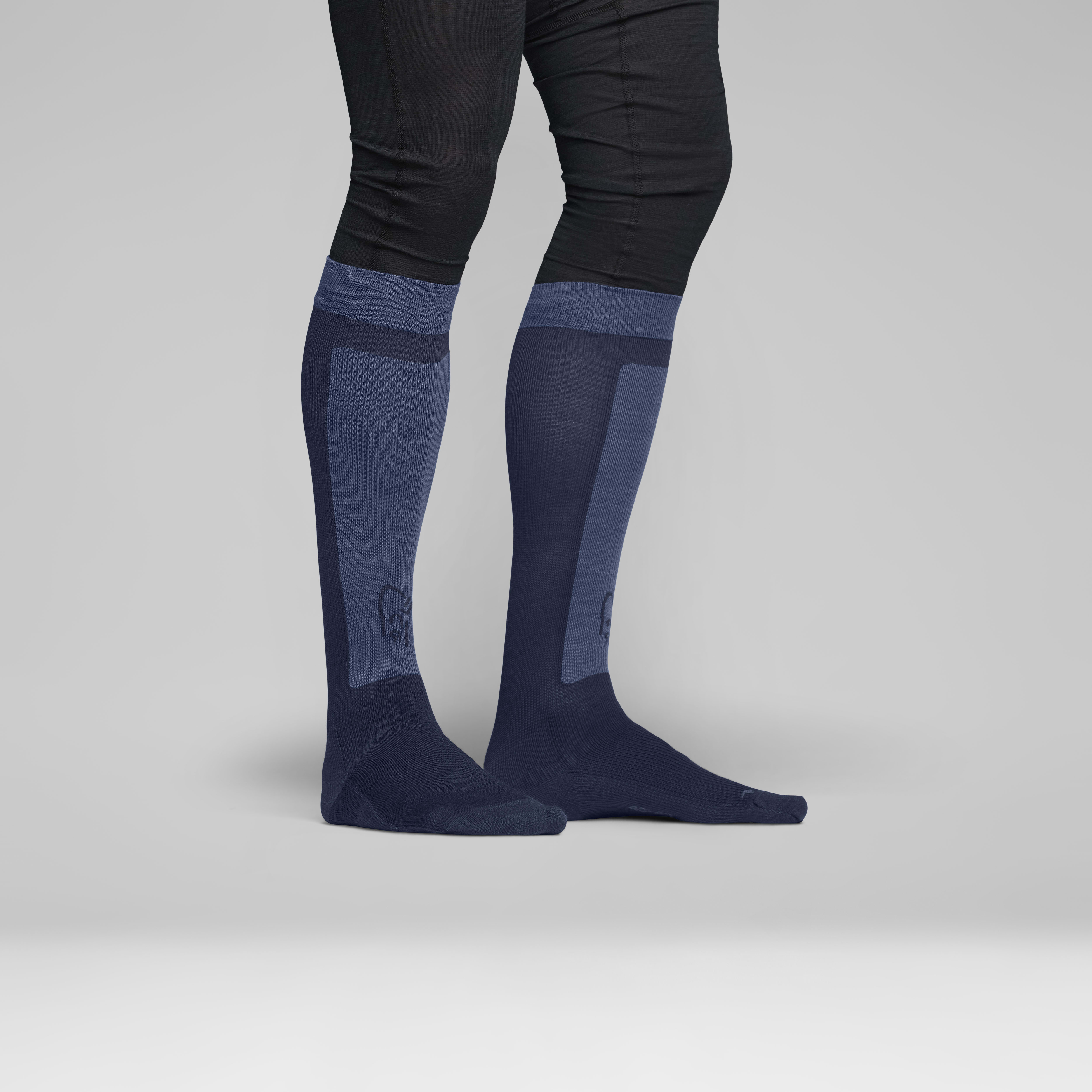 Female Look back image of lyngen light merinoUll long Socks Indigo Night/Dark Denim