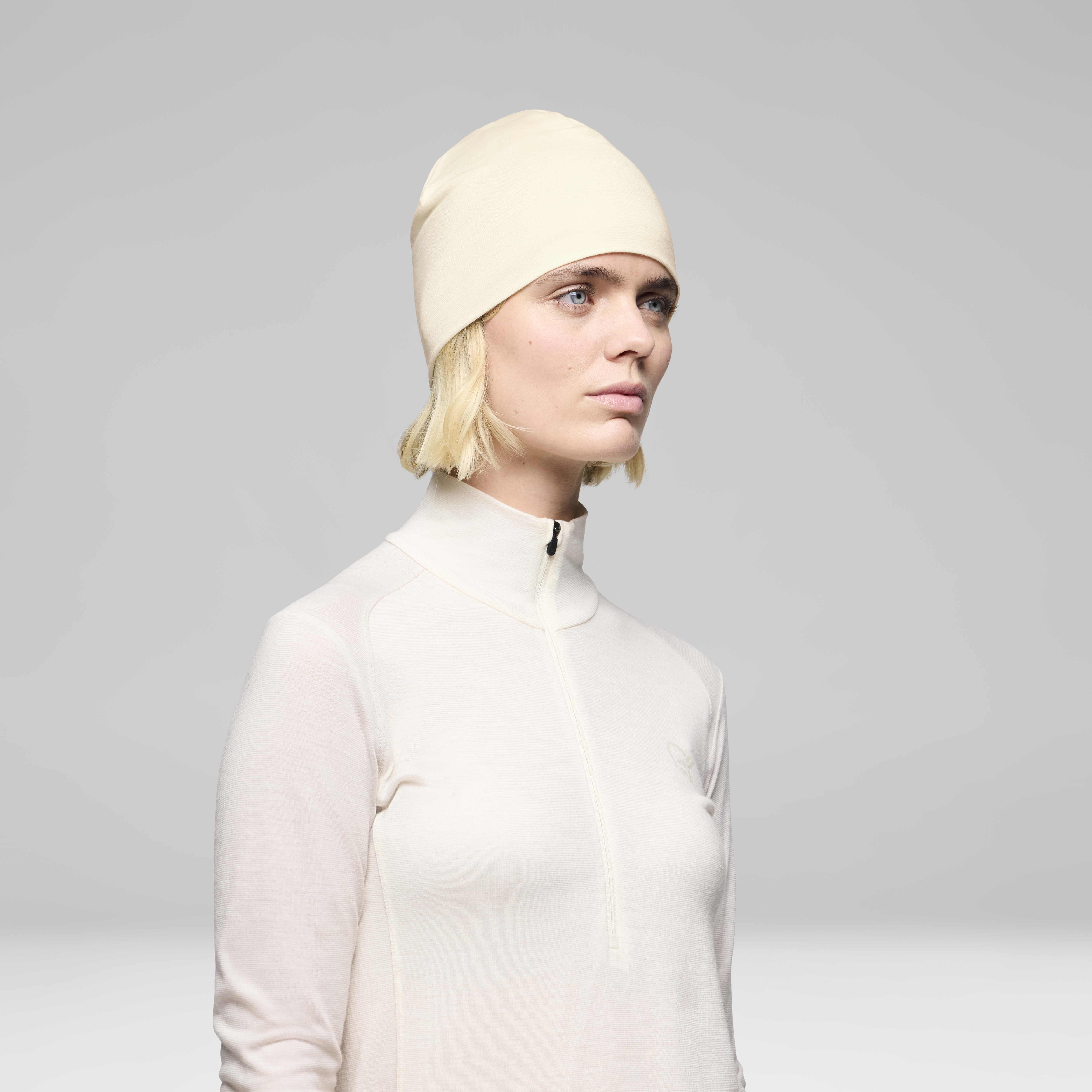 Female Look back image of 29 pureUll180 Beanie Whisper White