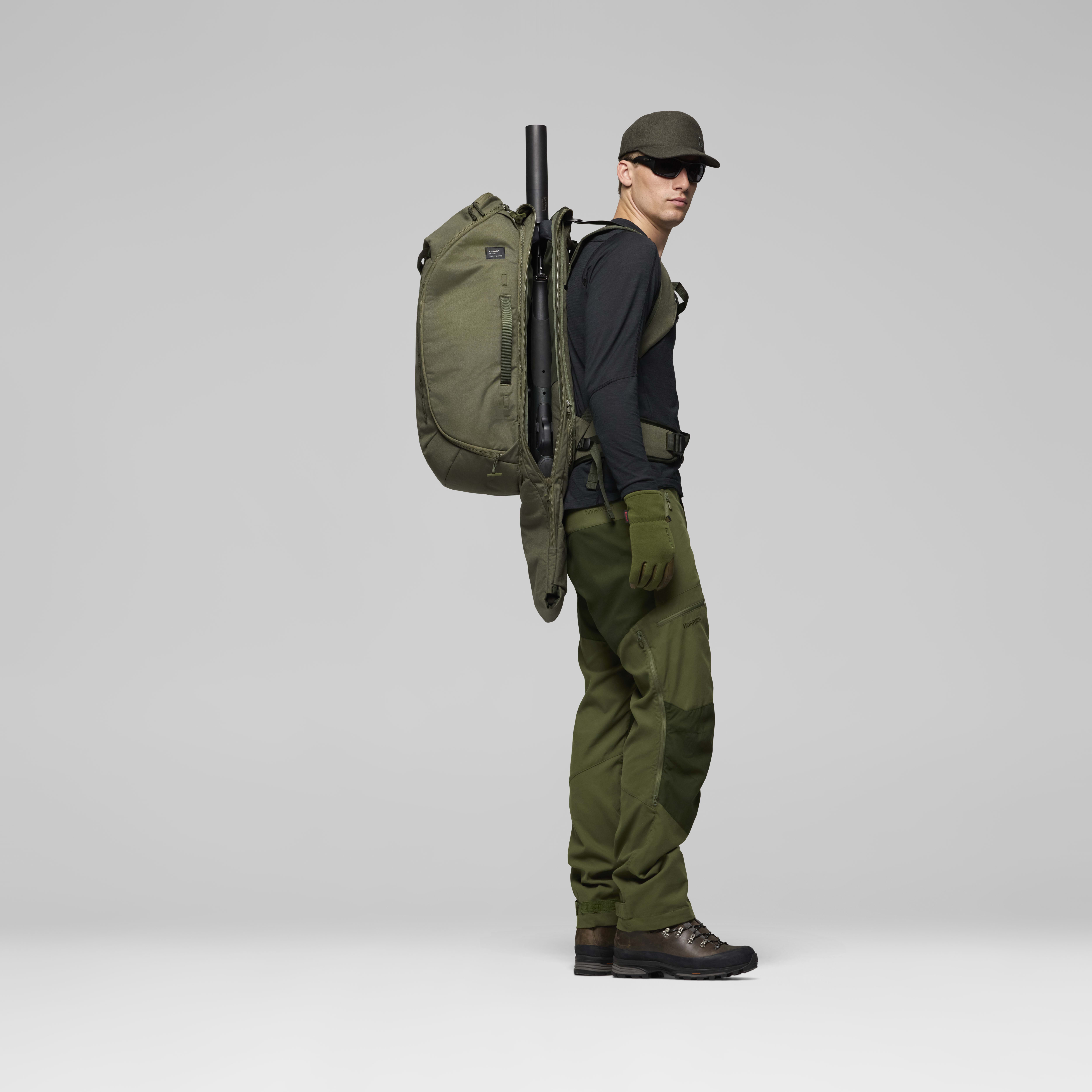 Female Look back image of kvinnherad 45L Pack Olive Night