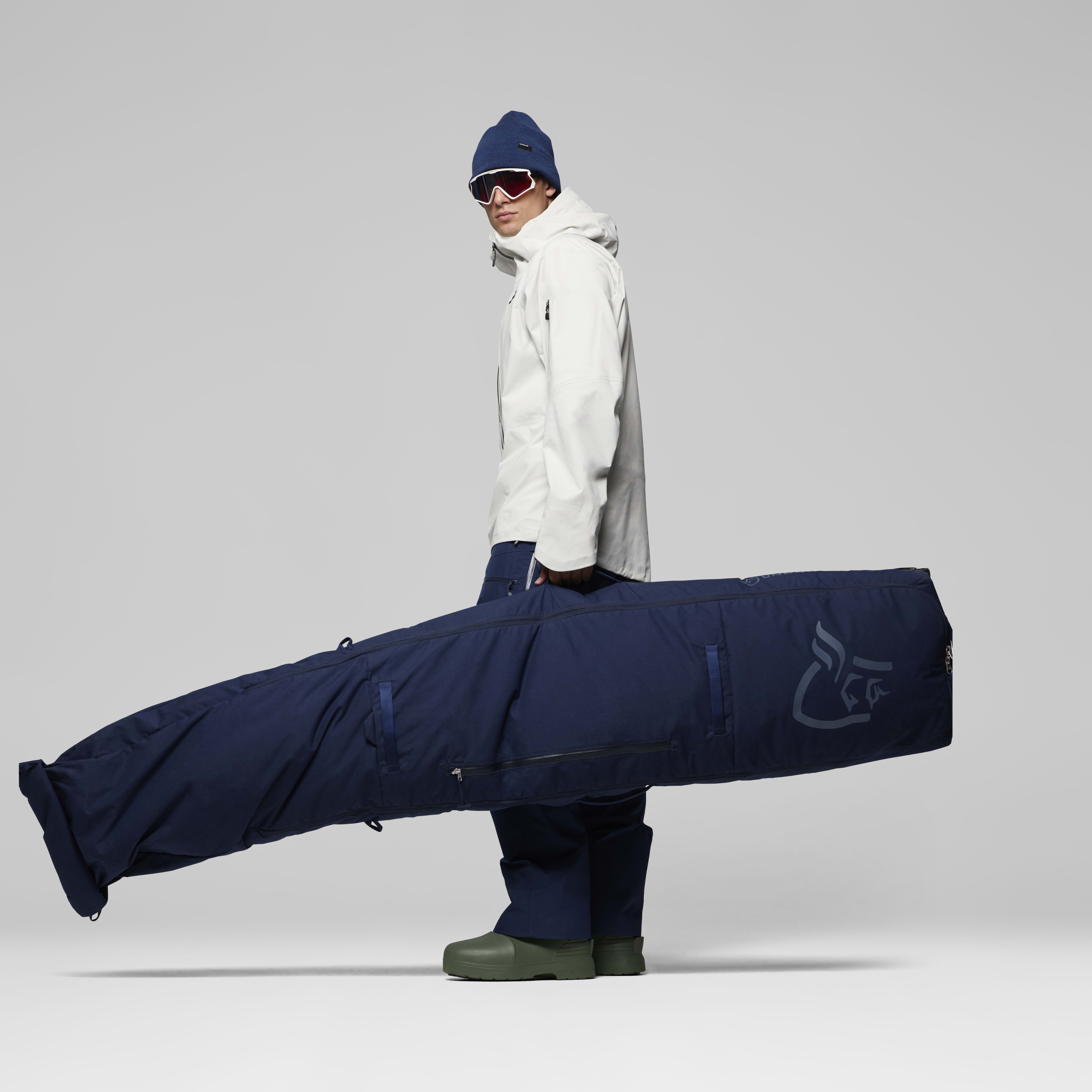Female Look back image of norrona XL Ski Bag Indigo Night