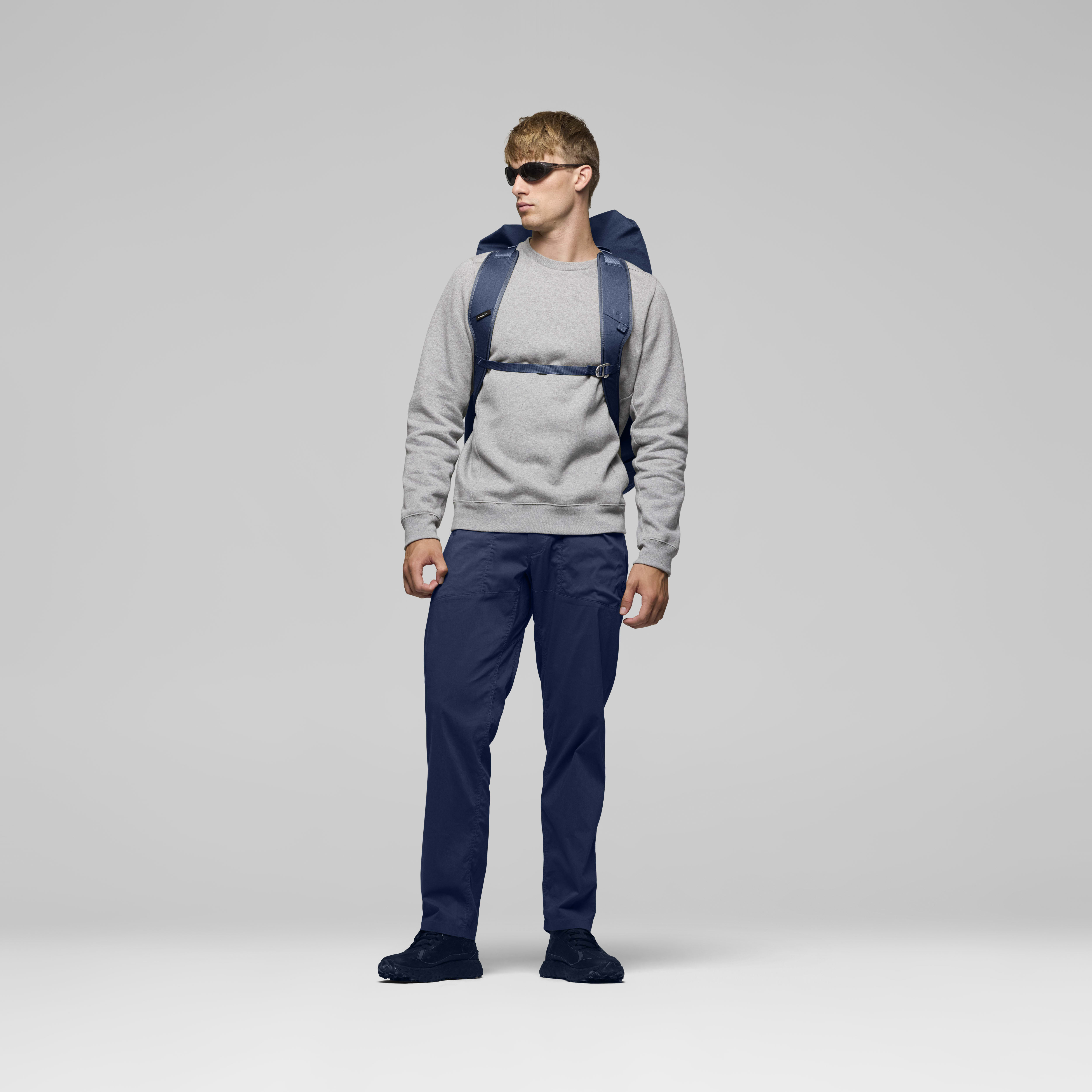 Female Look back image of norrona 90L Duffel Bag Indigo Night