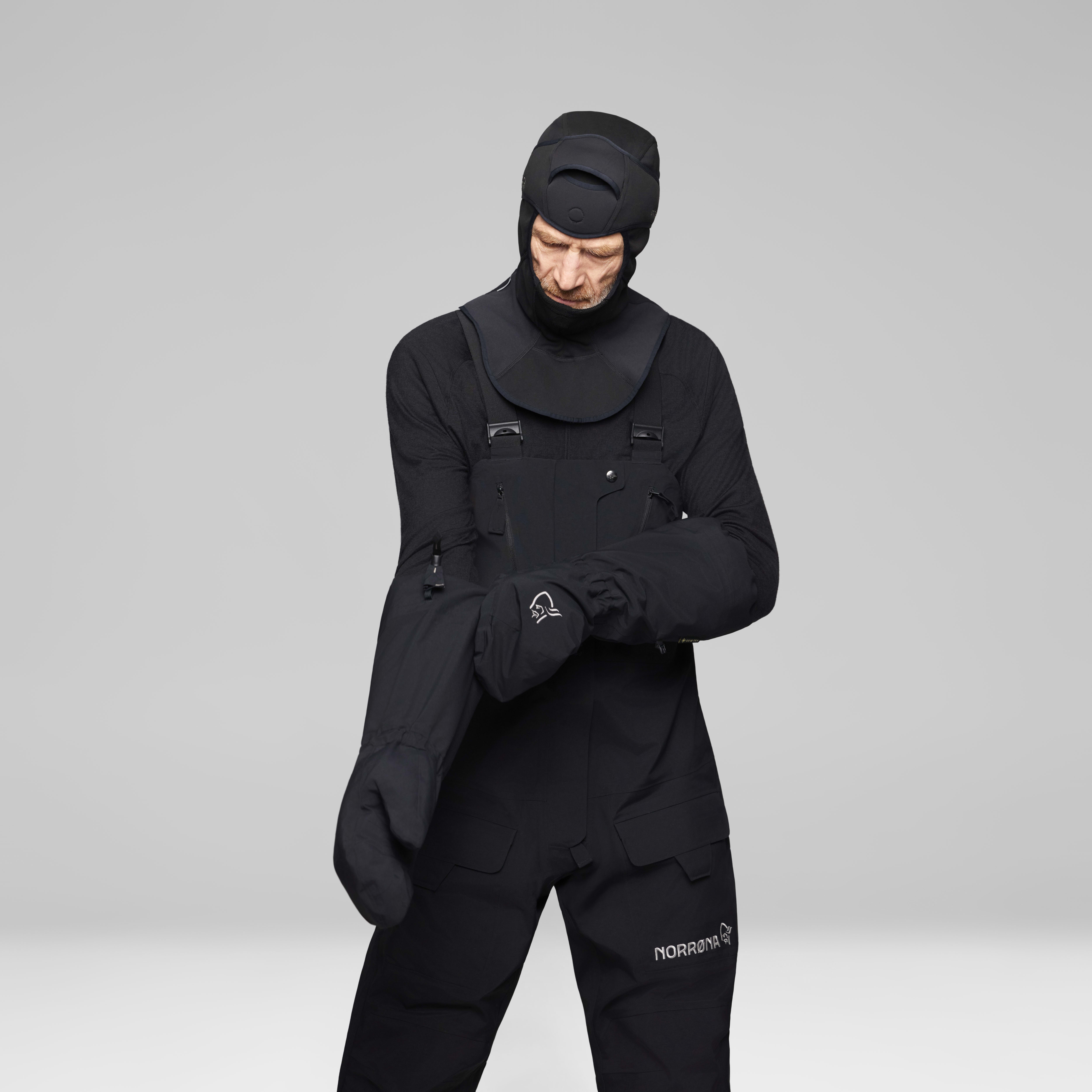 Female Look back image of arktis Gore-Tex Ousland Edition Mittens Caviar Black