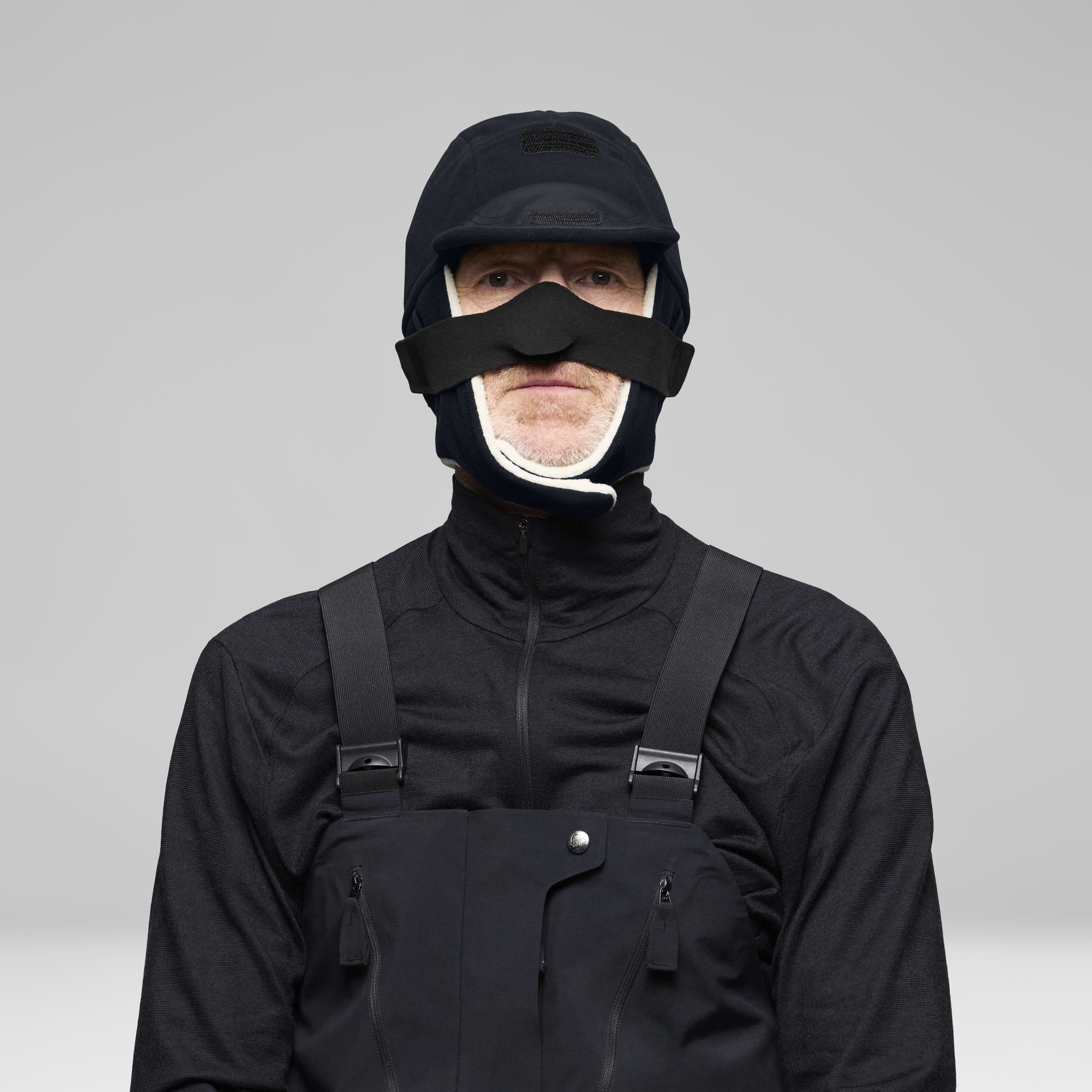 Female Look back image of arktis Windstopper Ousland Edition Cap Caviar Black