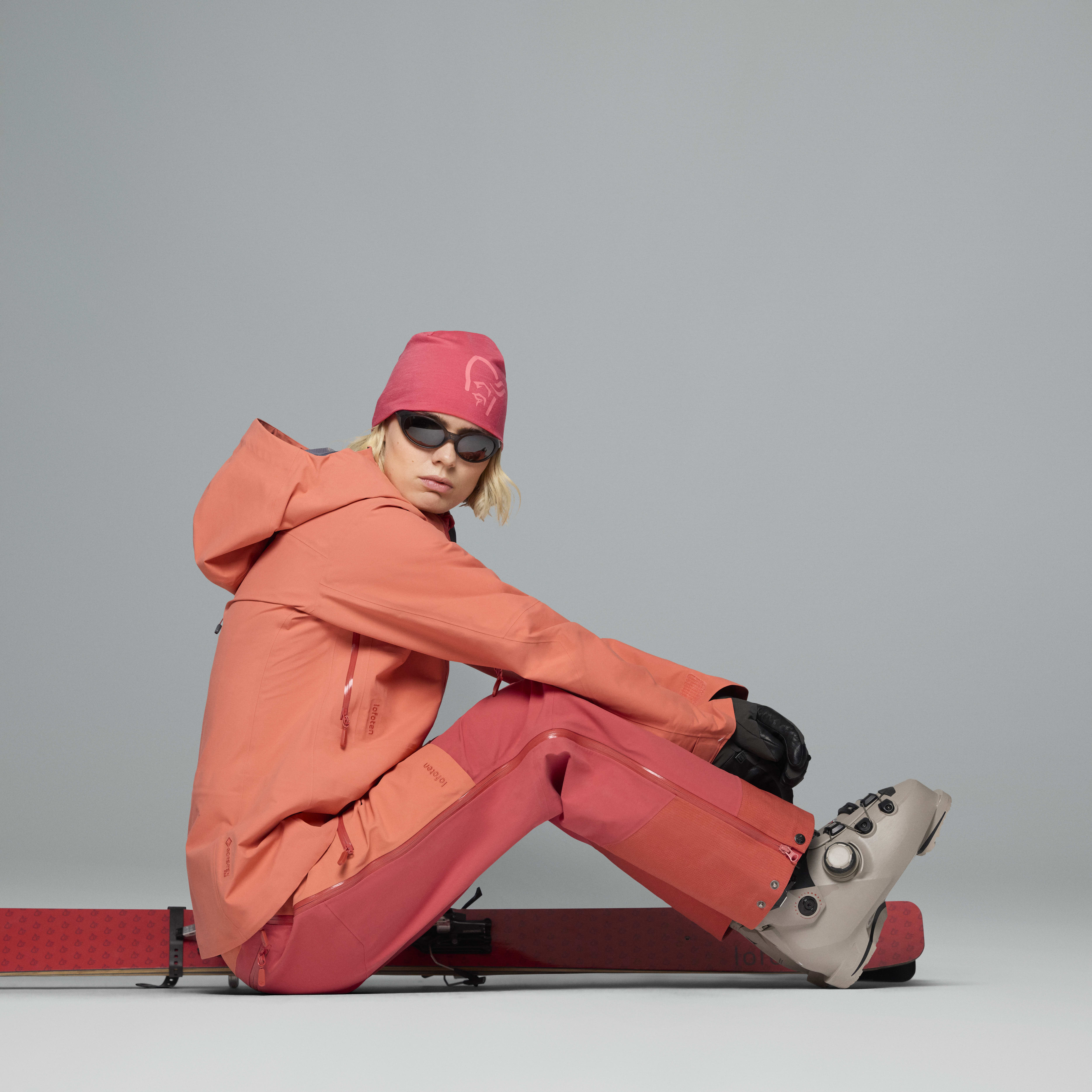 Female Look side image of lofoten warm2 Jacket Deep Sea Coral/Baked Apple