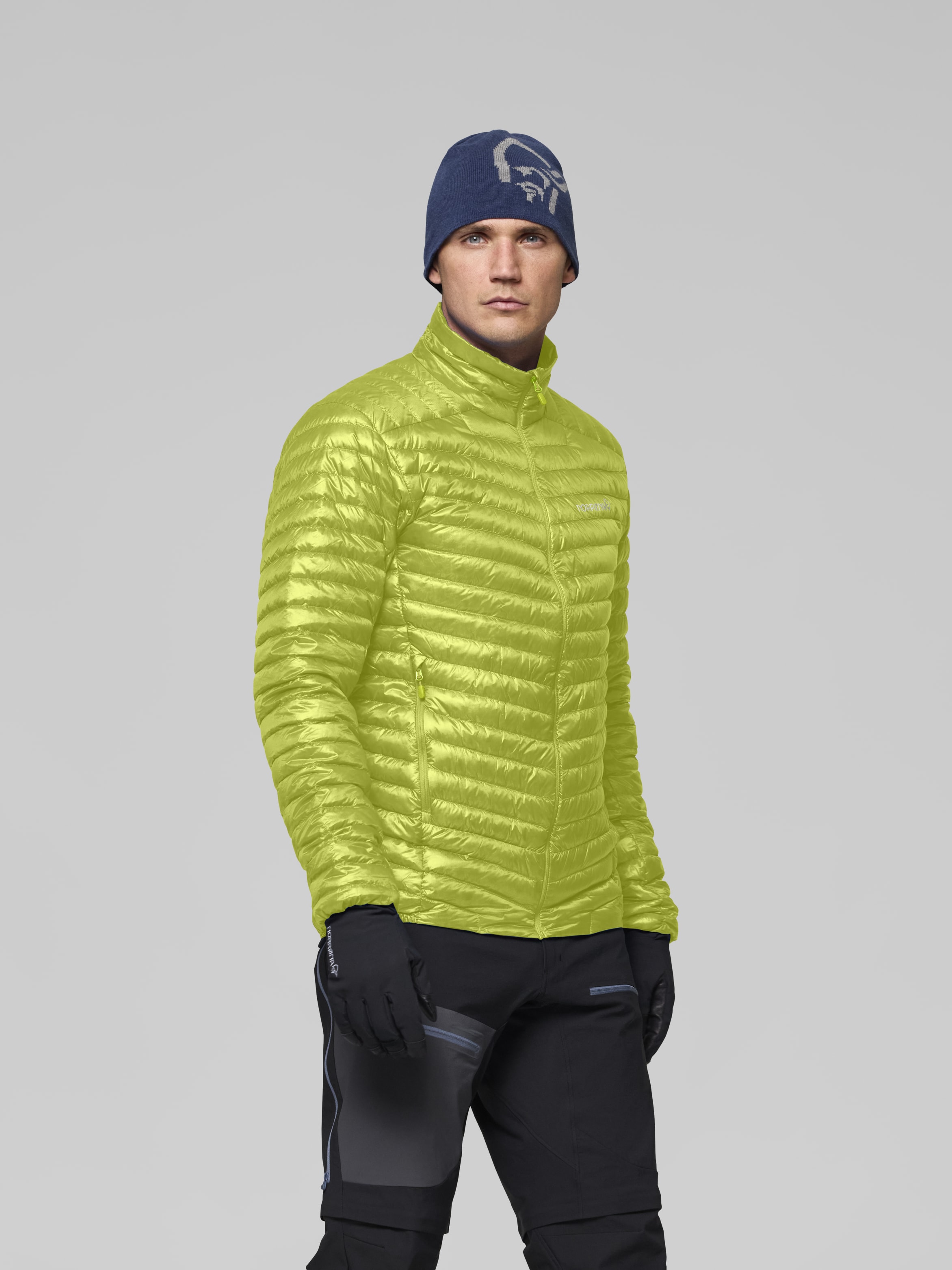Male Look image of trollveggen down800 super light Jacket Dark Citron