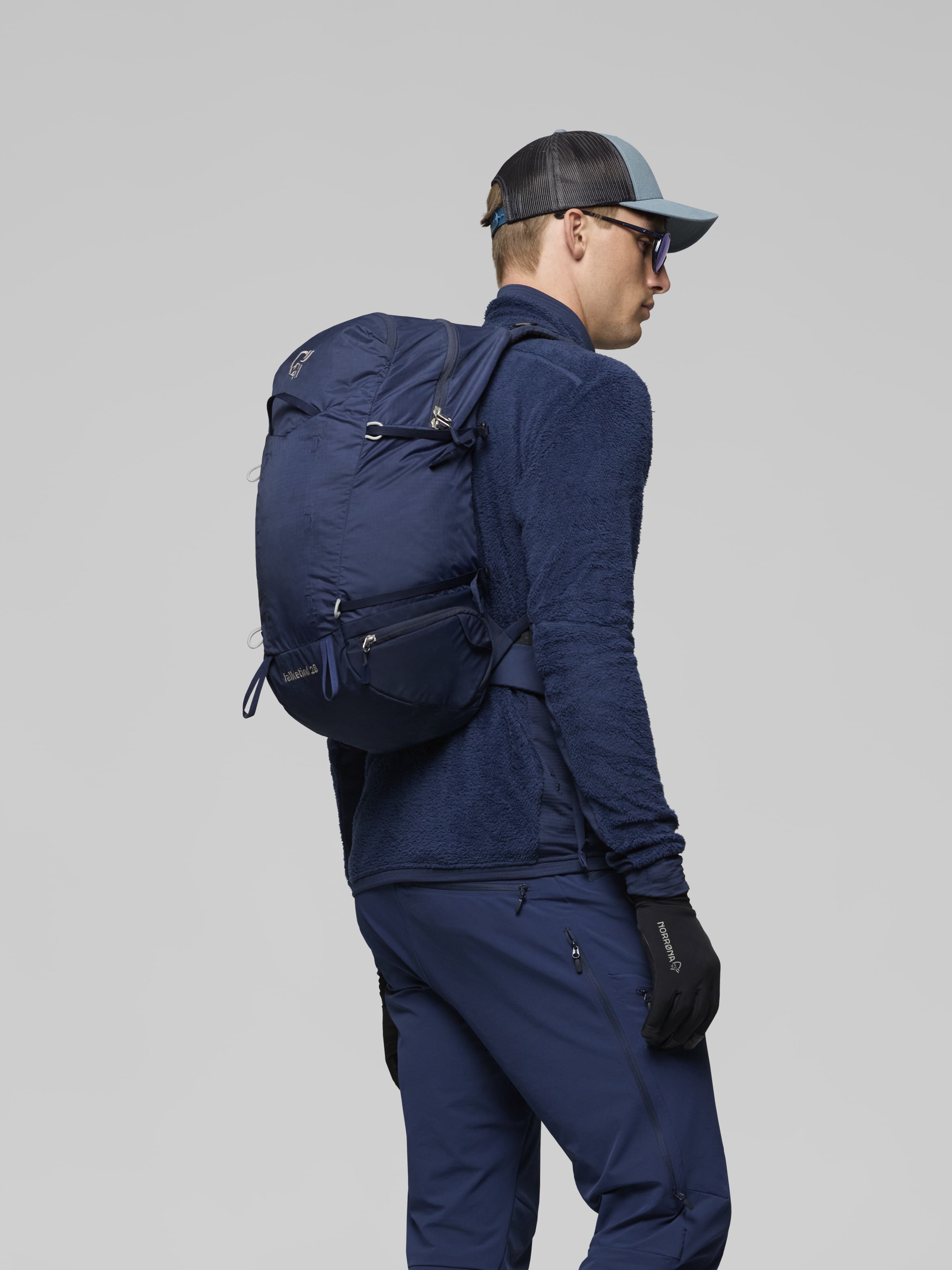 Female Look image of falketind econyl70 28L Pack Indigo Night