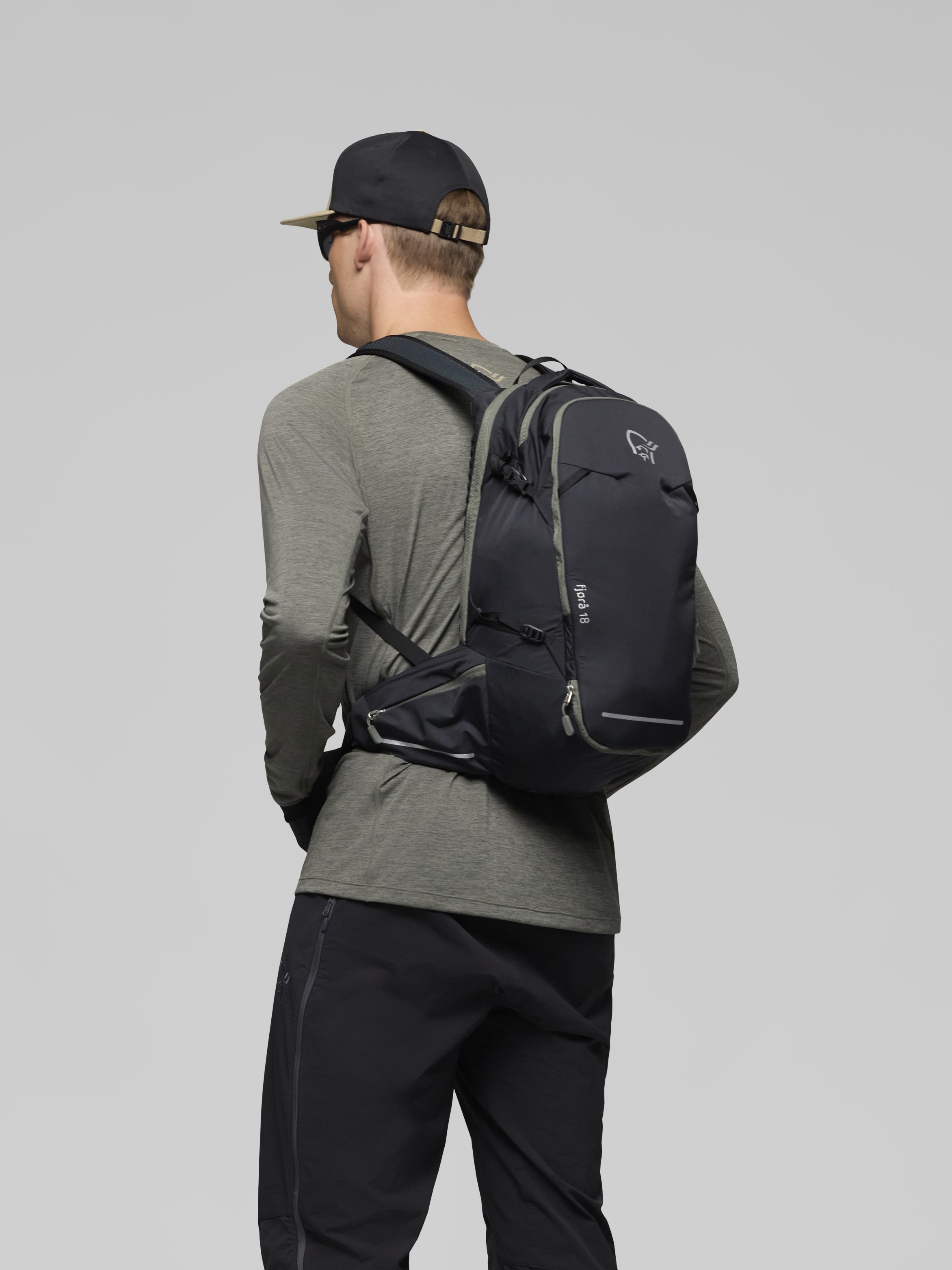 Female Look image of fjora econyl195 18L Pack Caviar Black