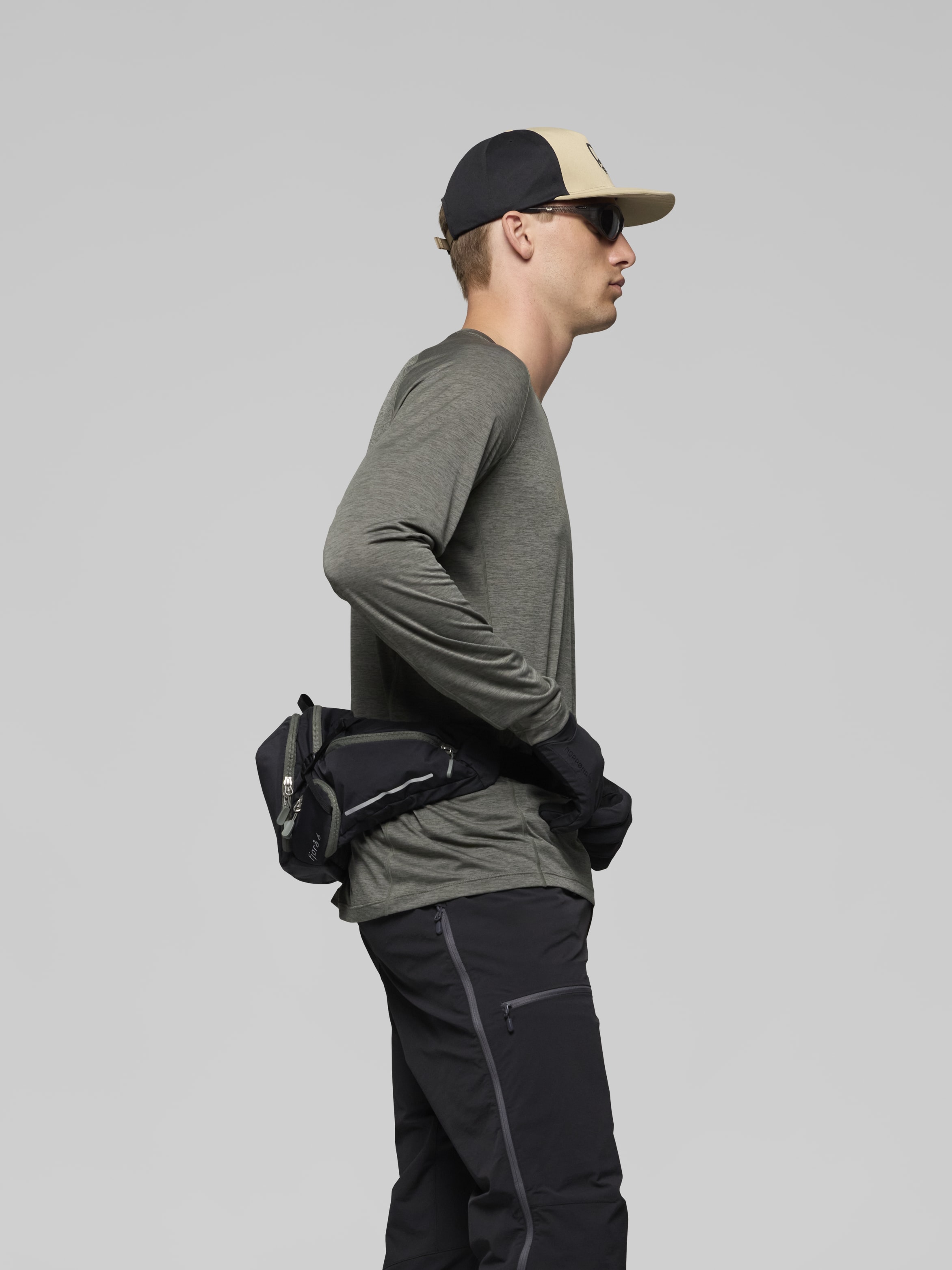 Female Look image of fjora econyl195 6L Hip Pack Caviar Black