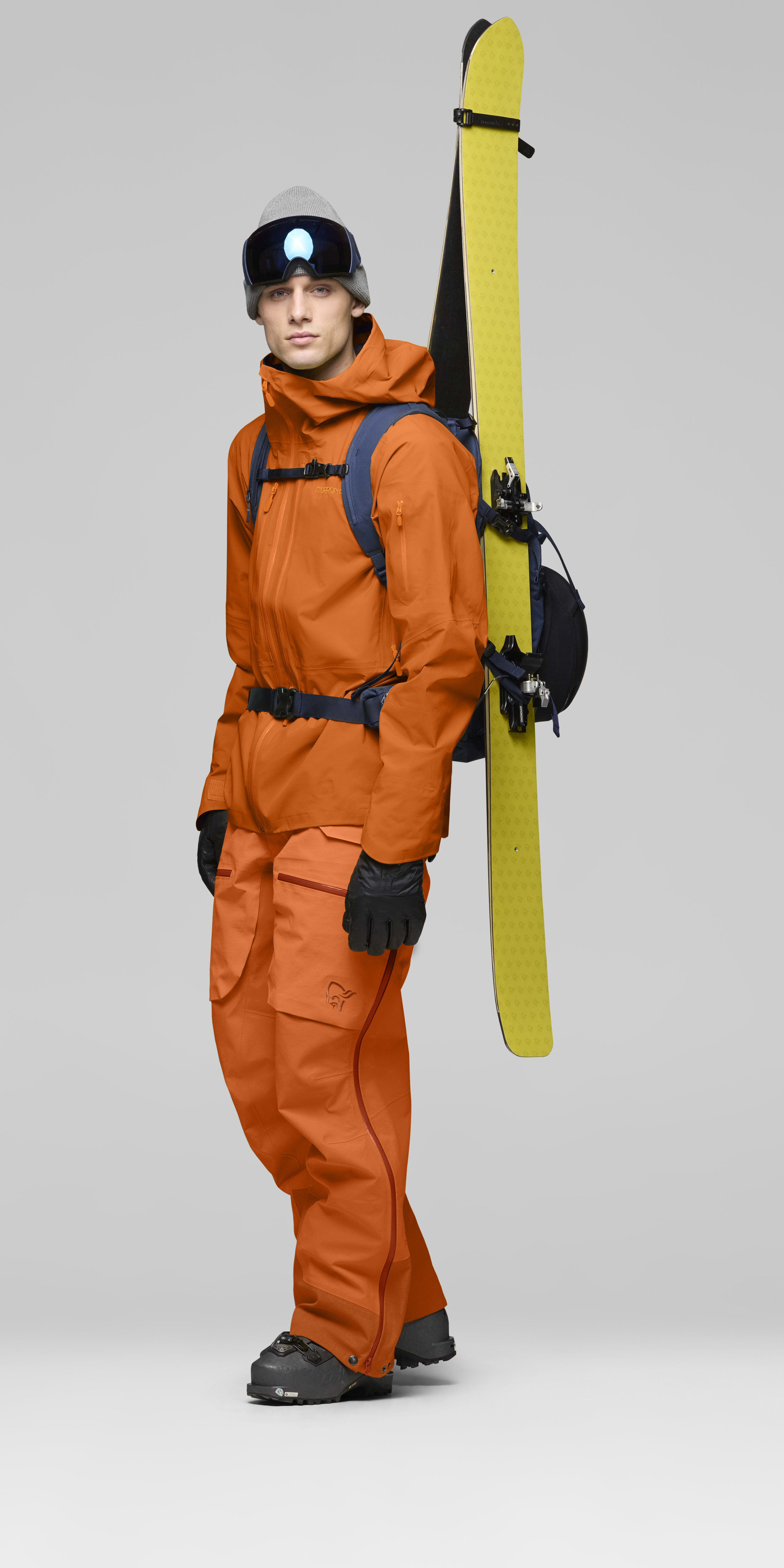 Male Look opening image of lofoten Gore-Tex Pro Pants Gold Flame