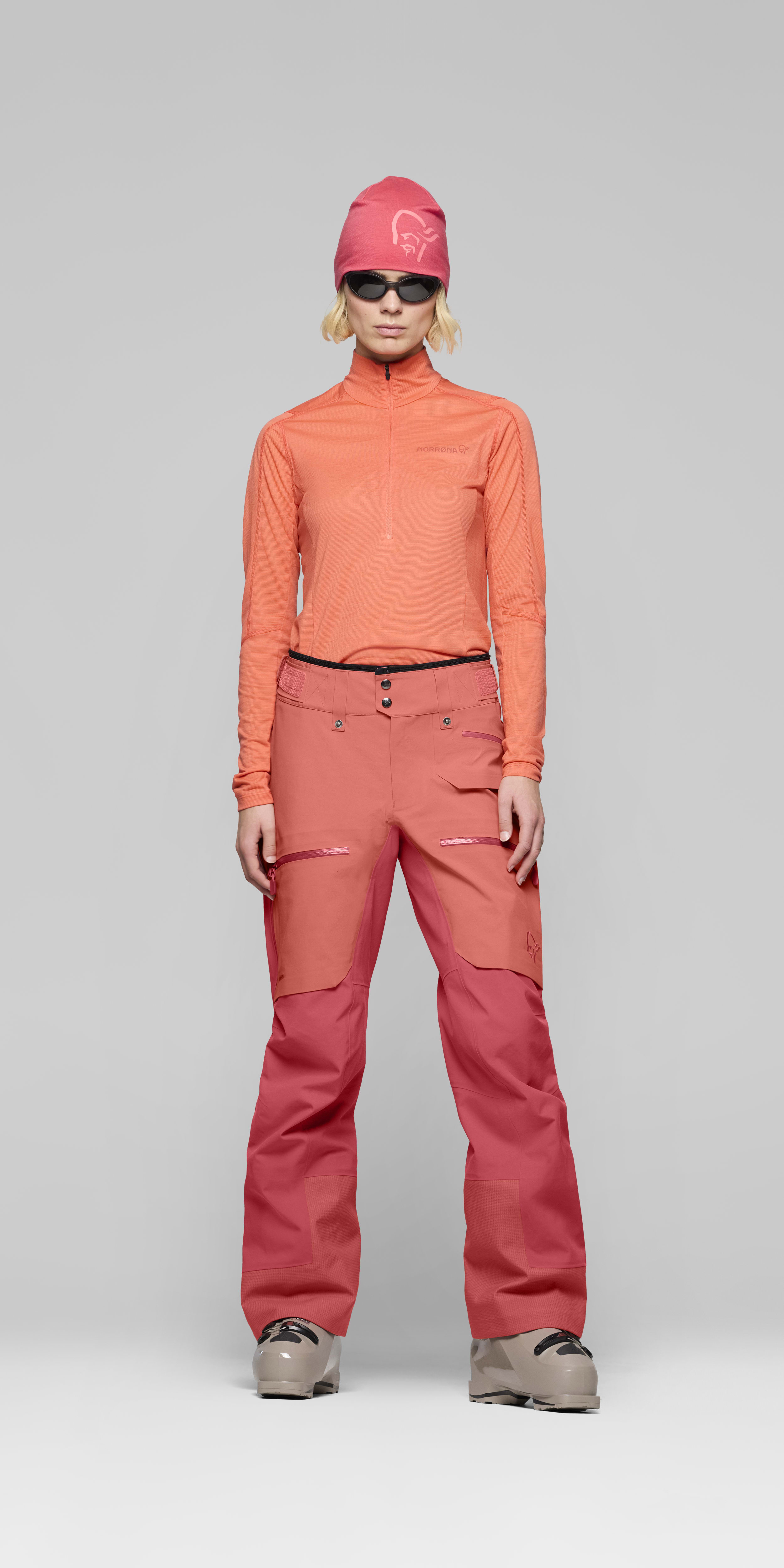 Female Look front image of lofoten Gore-Tex Pro Pants Deep Sea Coral/Baked Apple