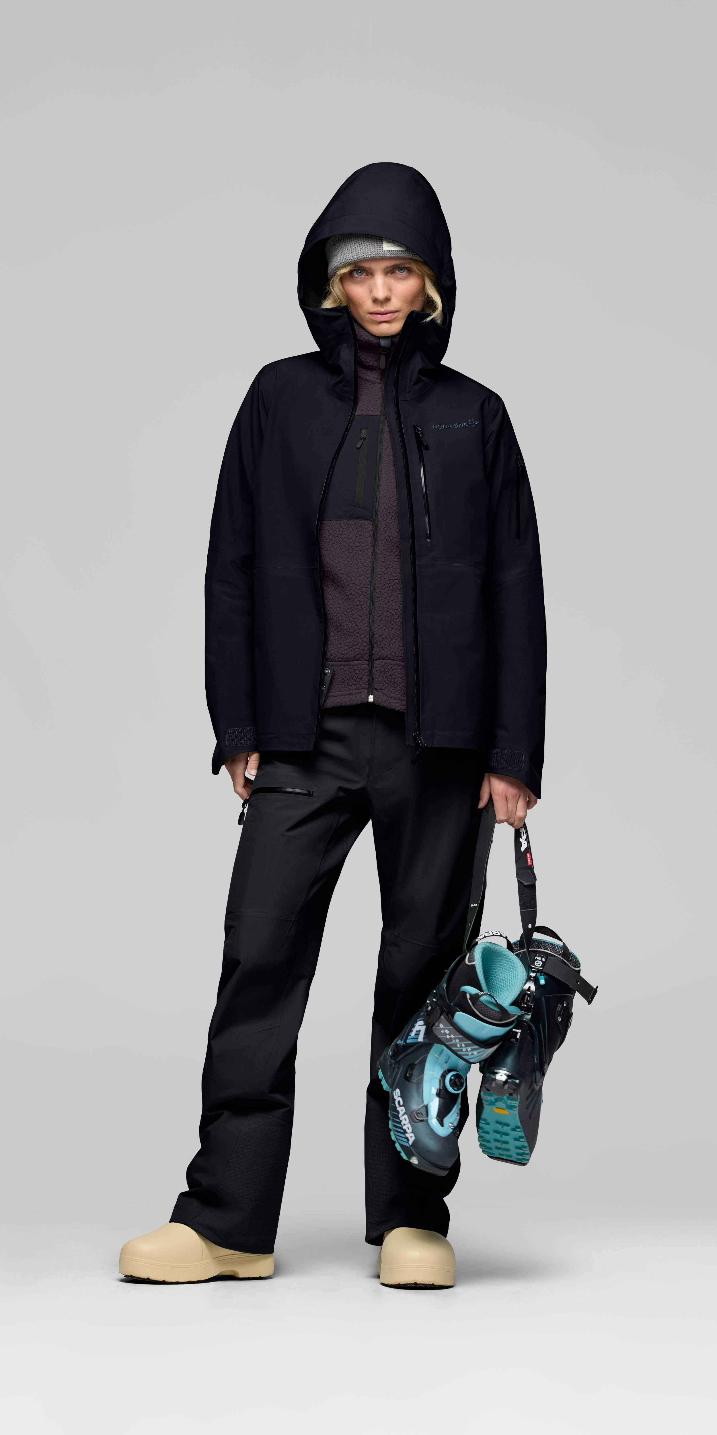 Female Look opening image of lofoten Gore-Tex Jacket Caviar Black