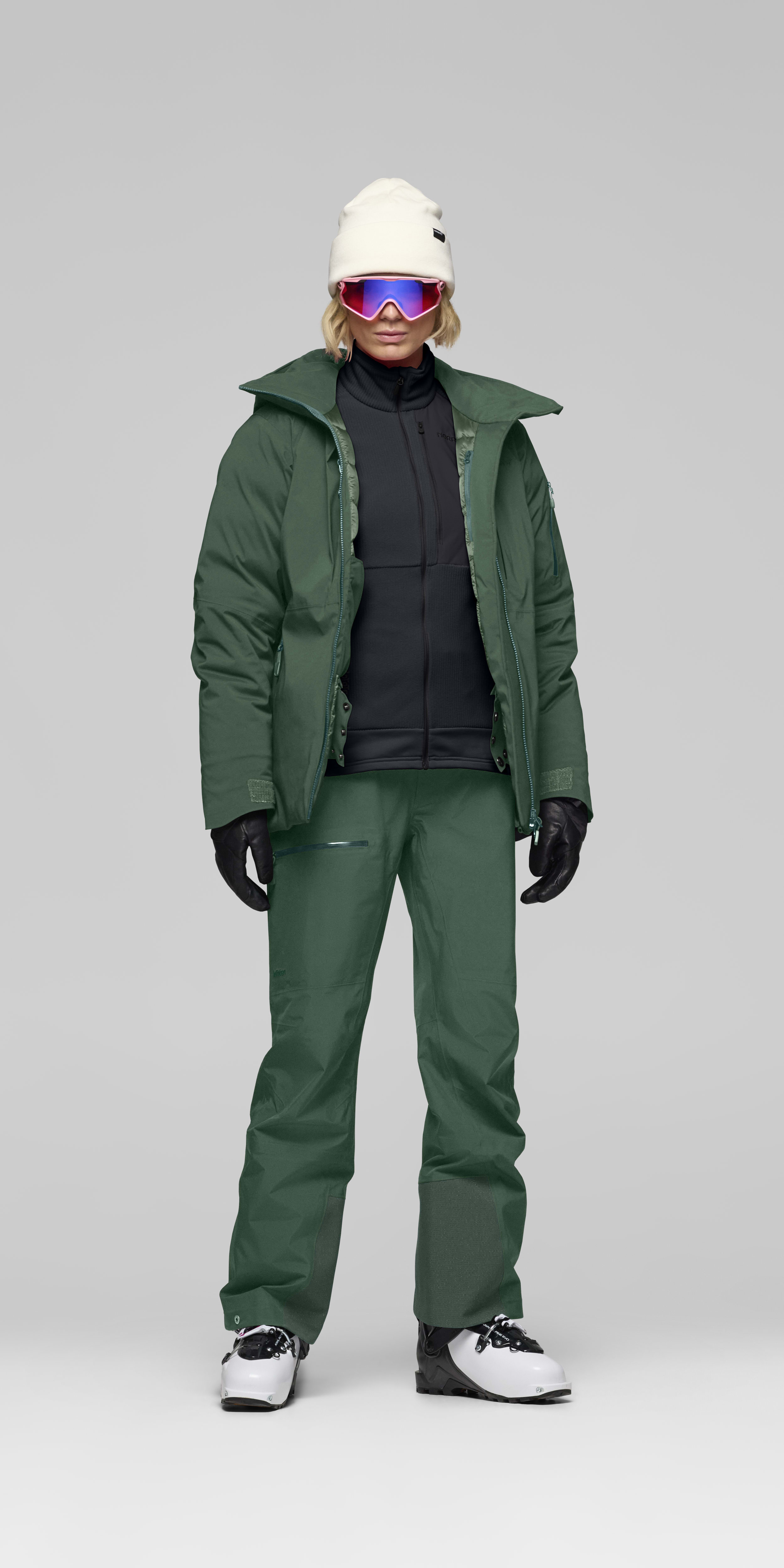 Female Look opening image of lofoten Gore-Tex down800 Jacket Jungle Green