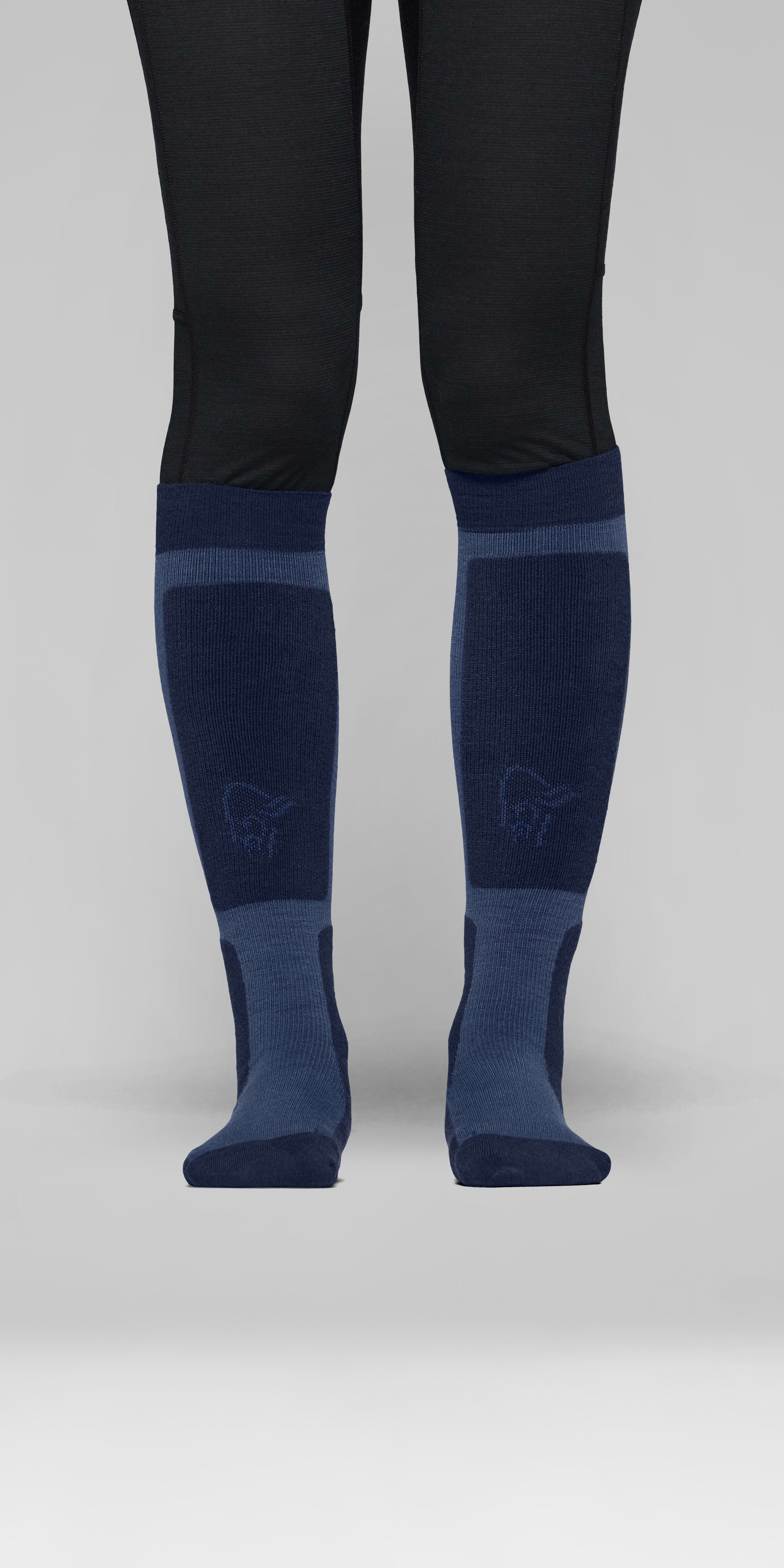 Female Look front image of lofoten mid merinoUll long Socks Indigo Night/Dark Denim