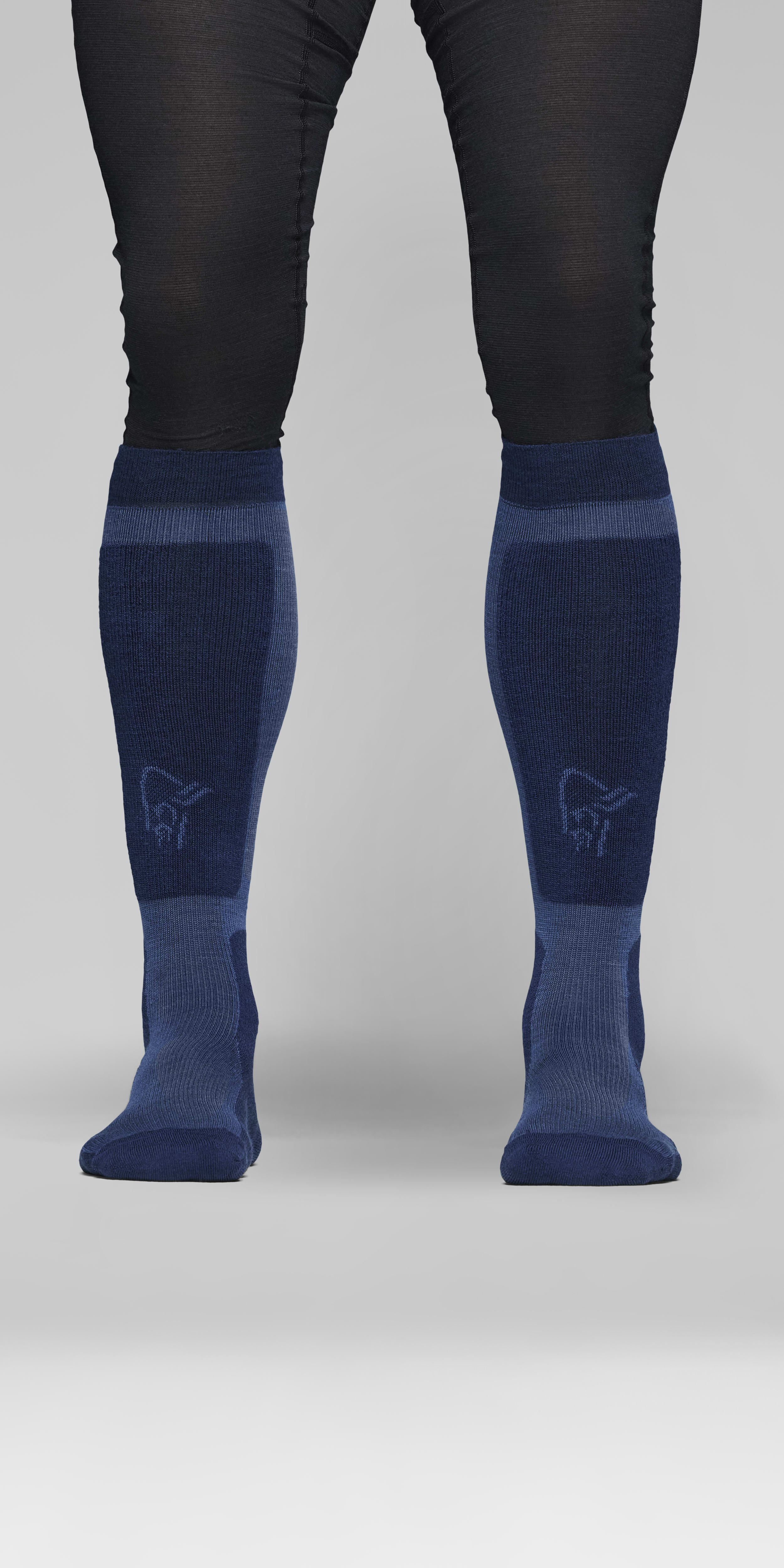 Female Look front image of lofoten mid merinoUll long Socks Indigo Night/Dark Denim