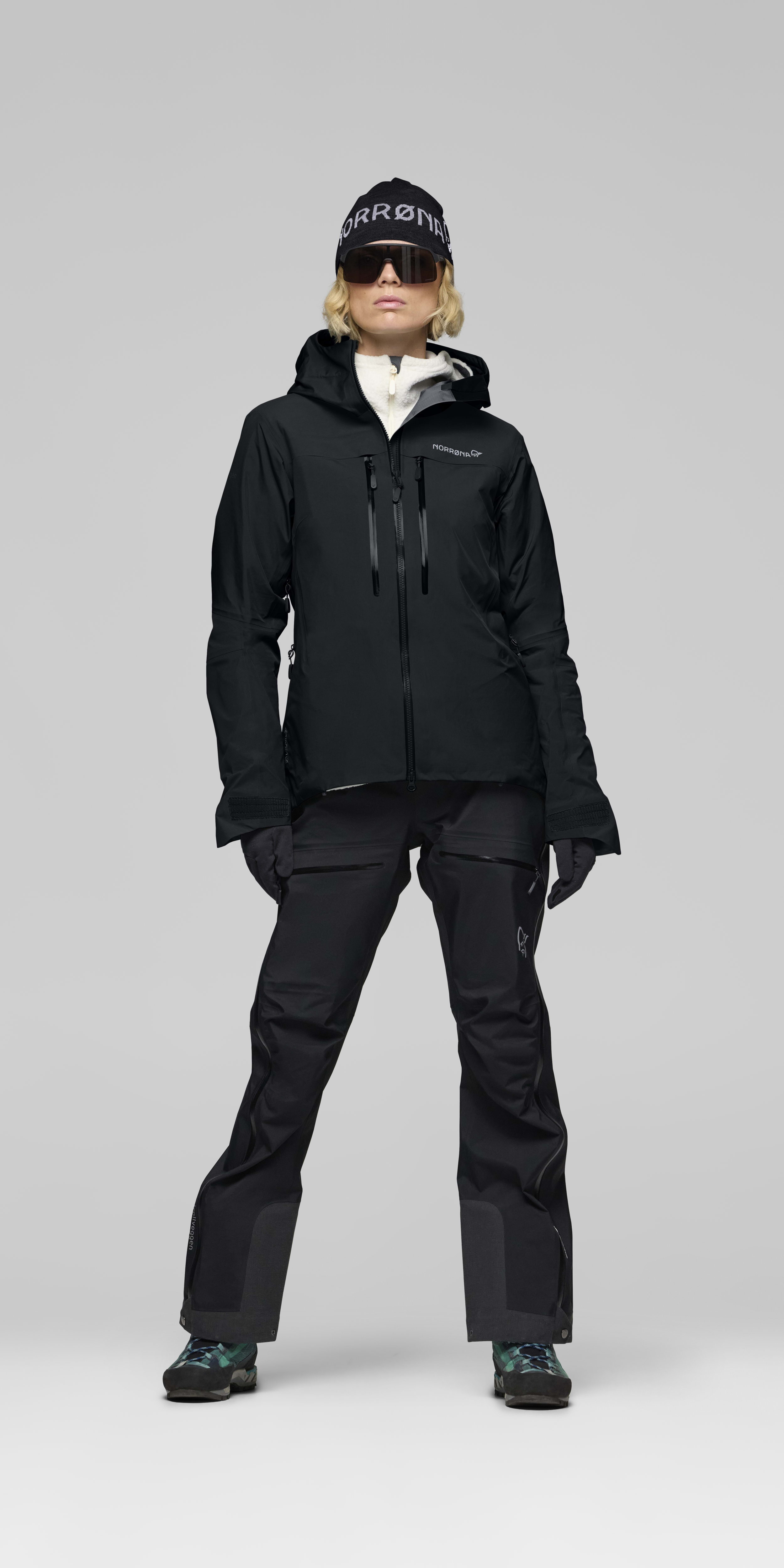 Female Look opening image of trollveggen Gore-Tex Pro light Jacket Caviar Black