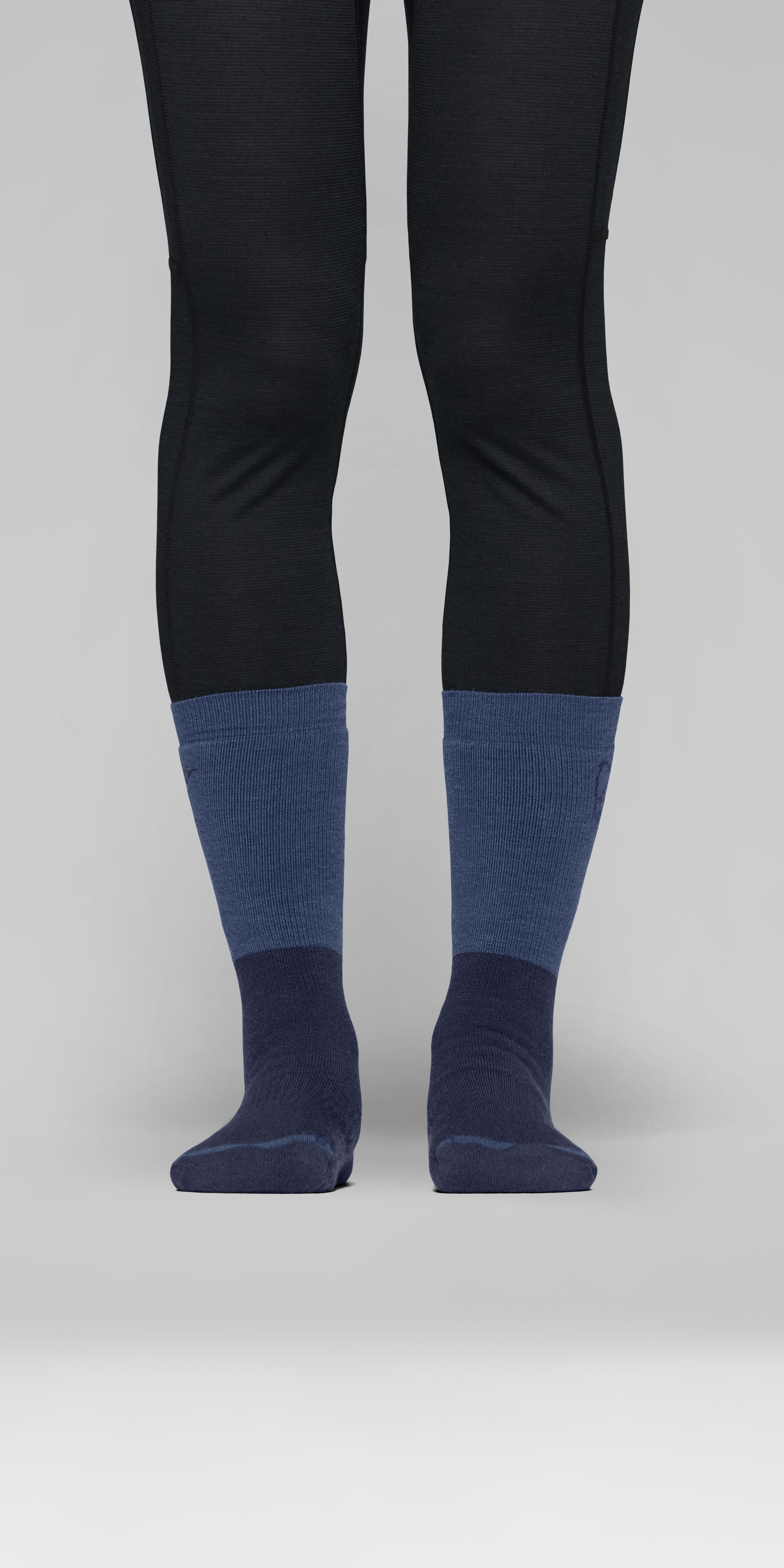 Female Look front image of trollveggen heavy merinoUll Socks Indigo Night/Dark Denim