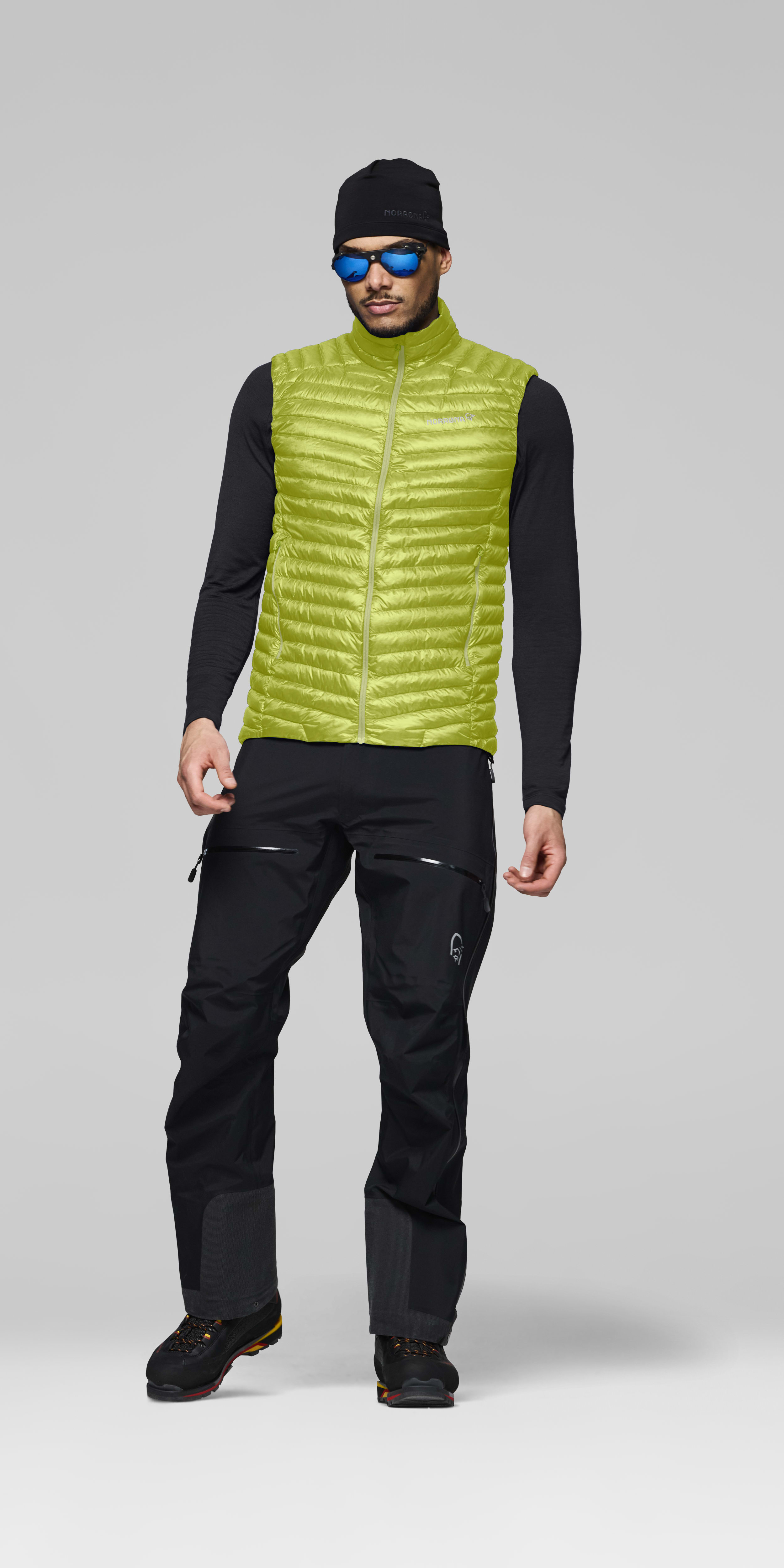 Male Look front image of trollveggen down800 super light Vest Dark Citron