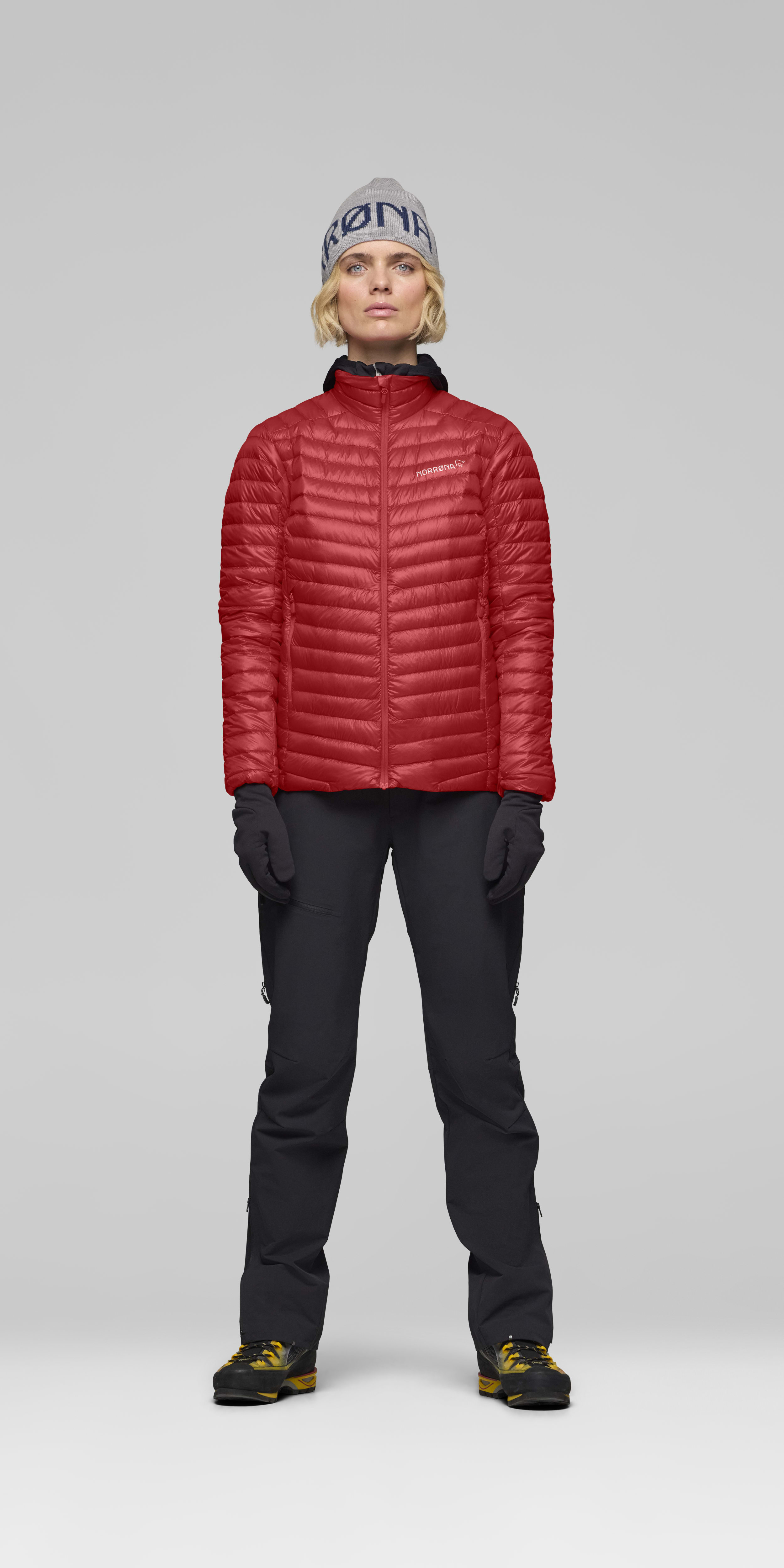 Female Look front image of trollveggen down800 super light Jacket Baked Apple