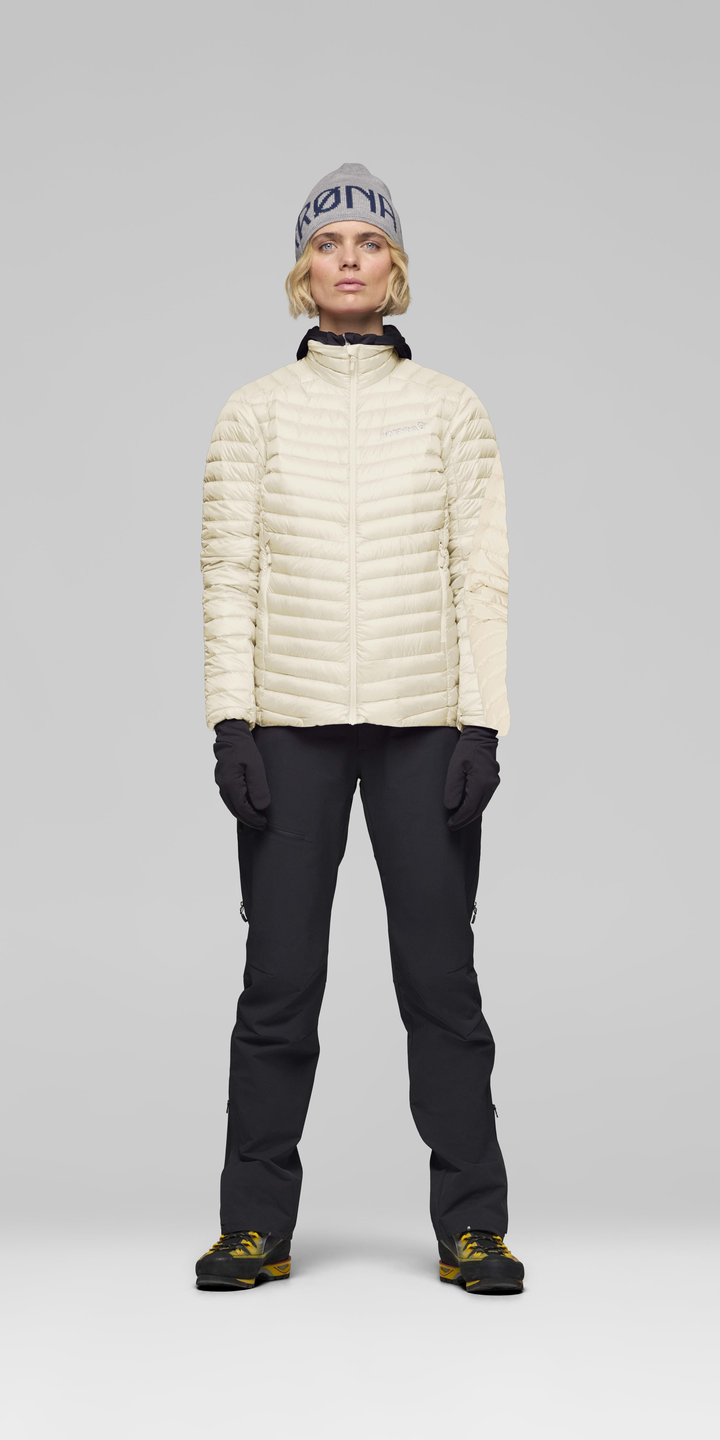 Female Look front image of trollveggen down800 super light Jacket Whisper White