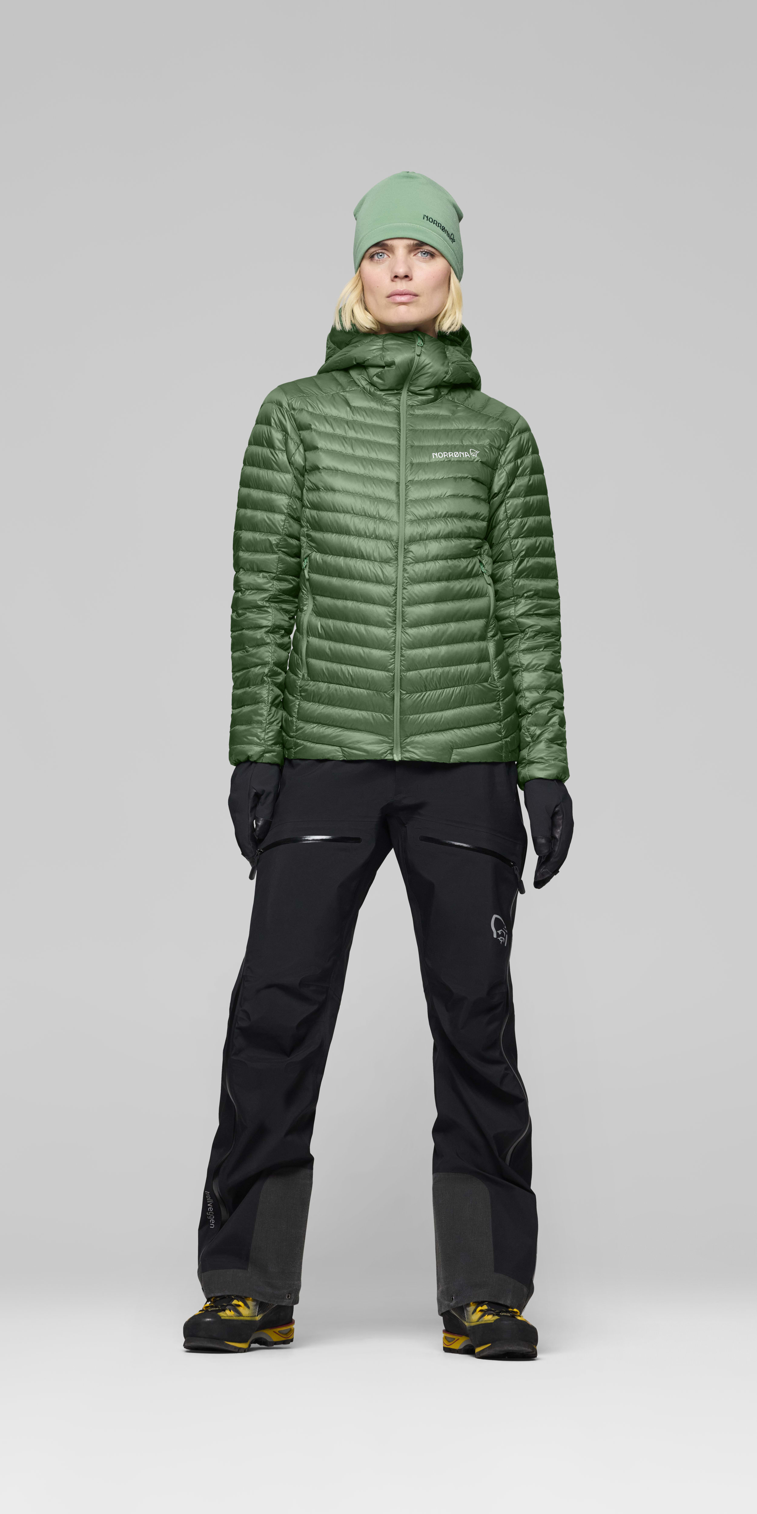 Female Look front image of trollveggen down800 super light Hood Dark Ivy