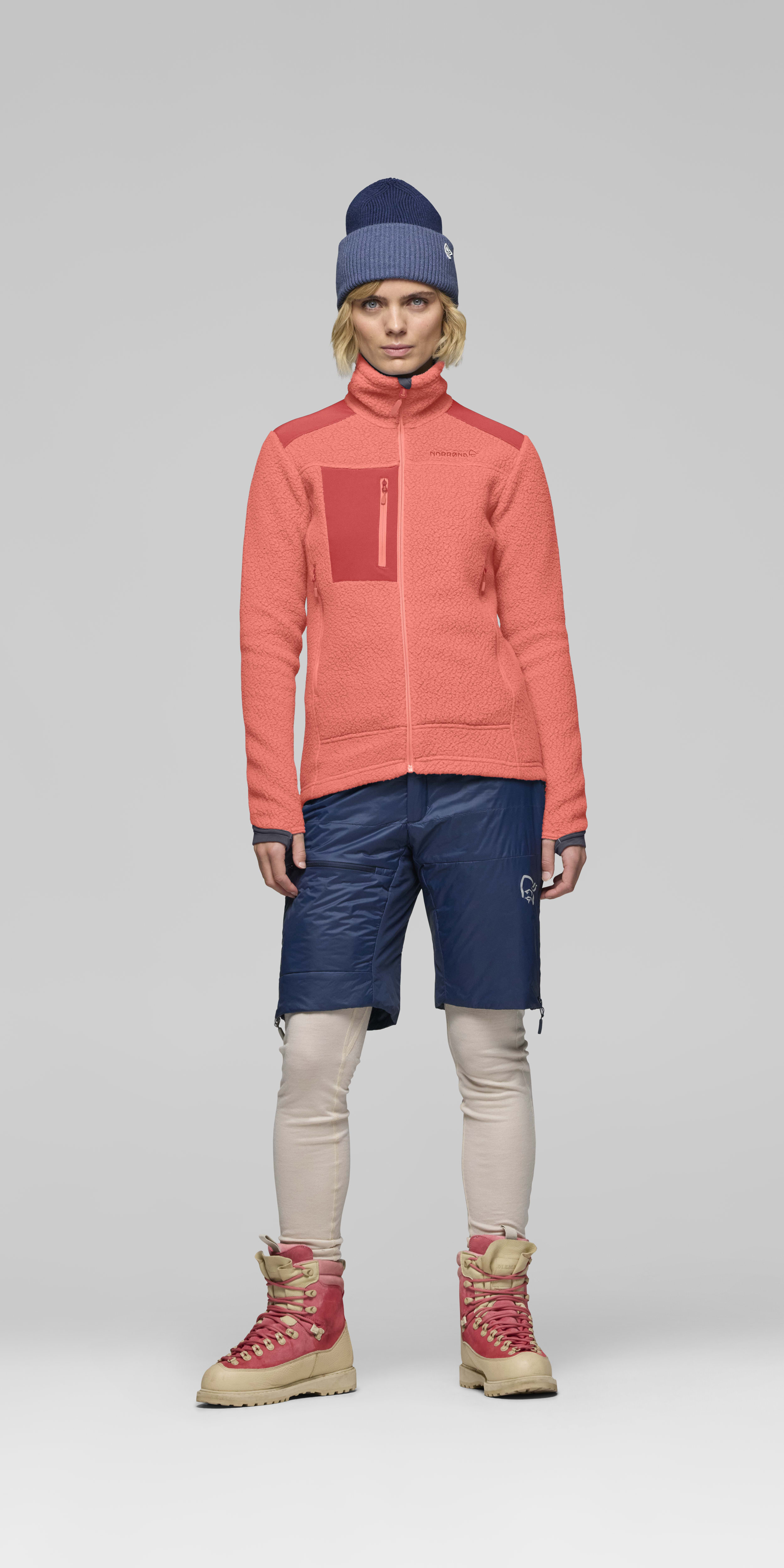 Female Look front image of trollveggen warm3 Jacket Deep Sea Coral/Baked Apple