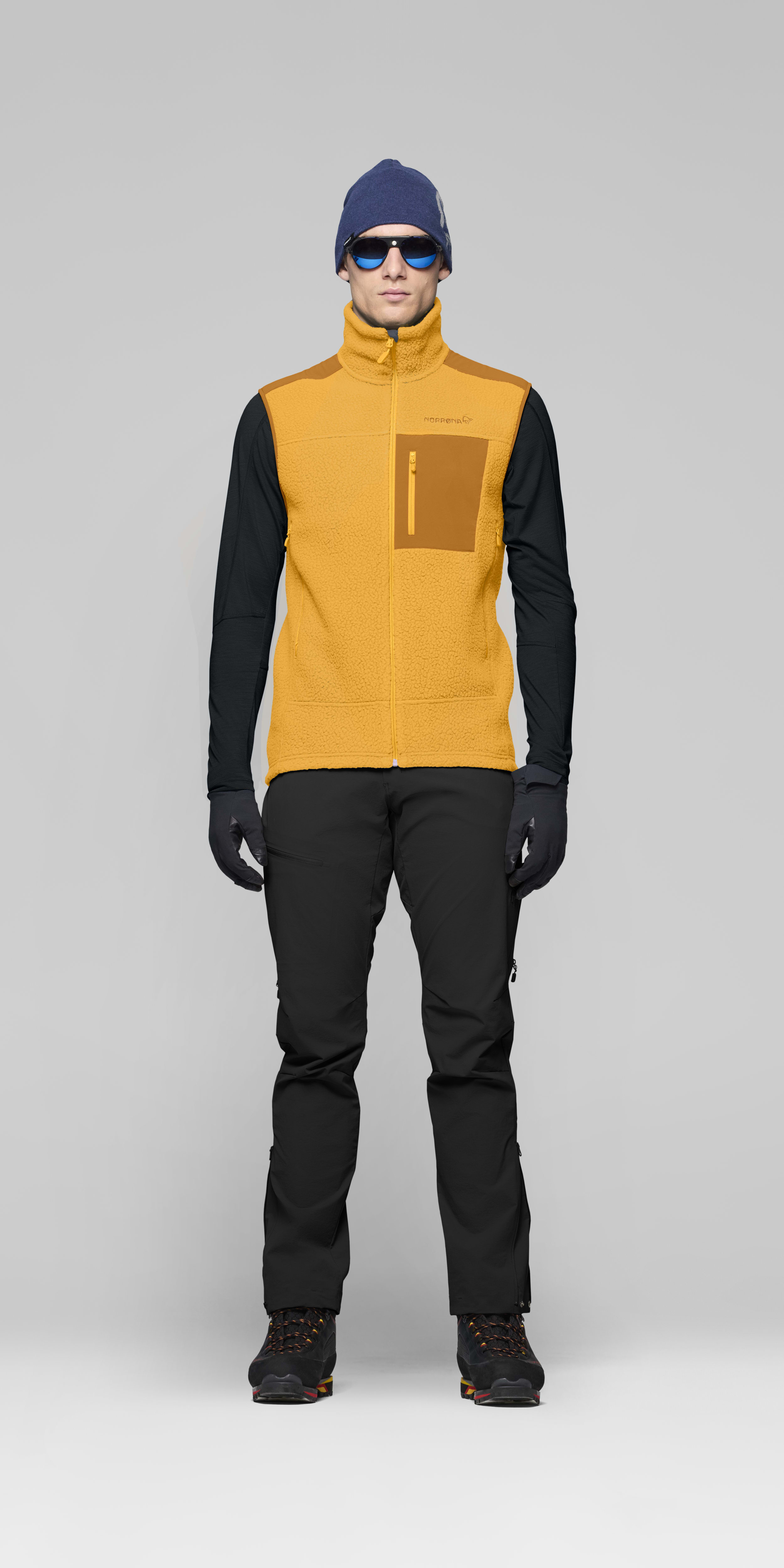Male Look front image of trollveggen warm3 Vest Sunflower/Honey Ginger
