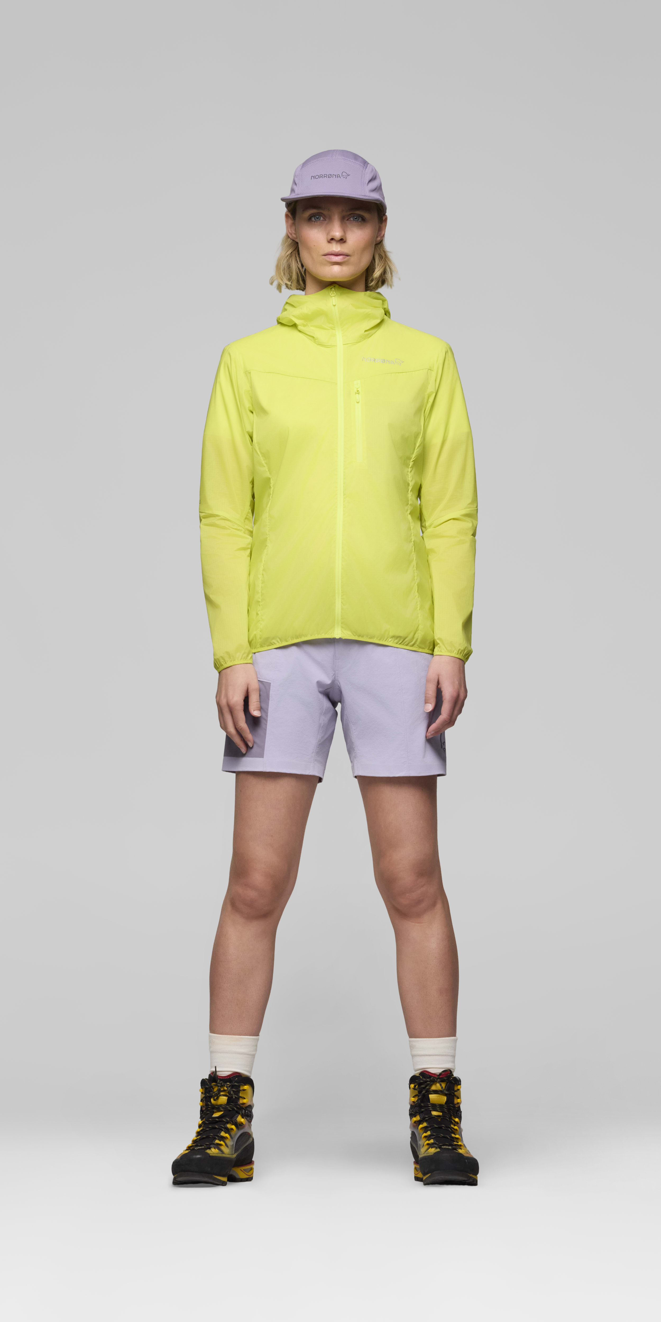 Female Look front image of falketind aero60 Zip Hood Limeade