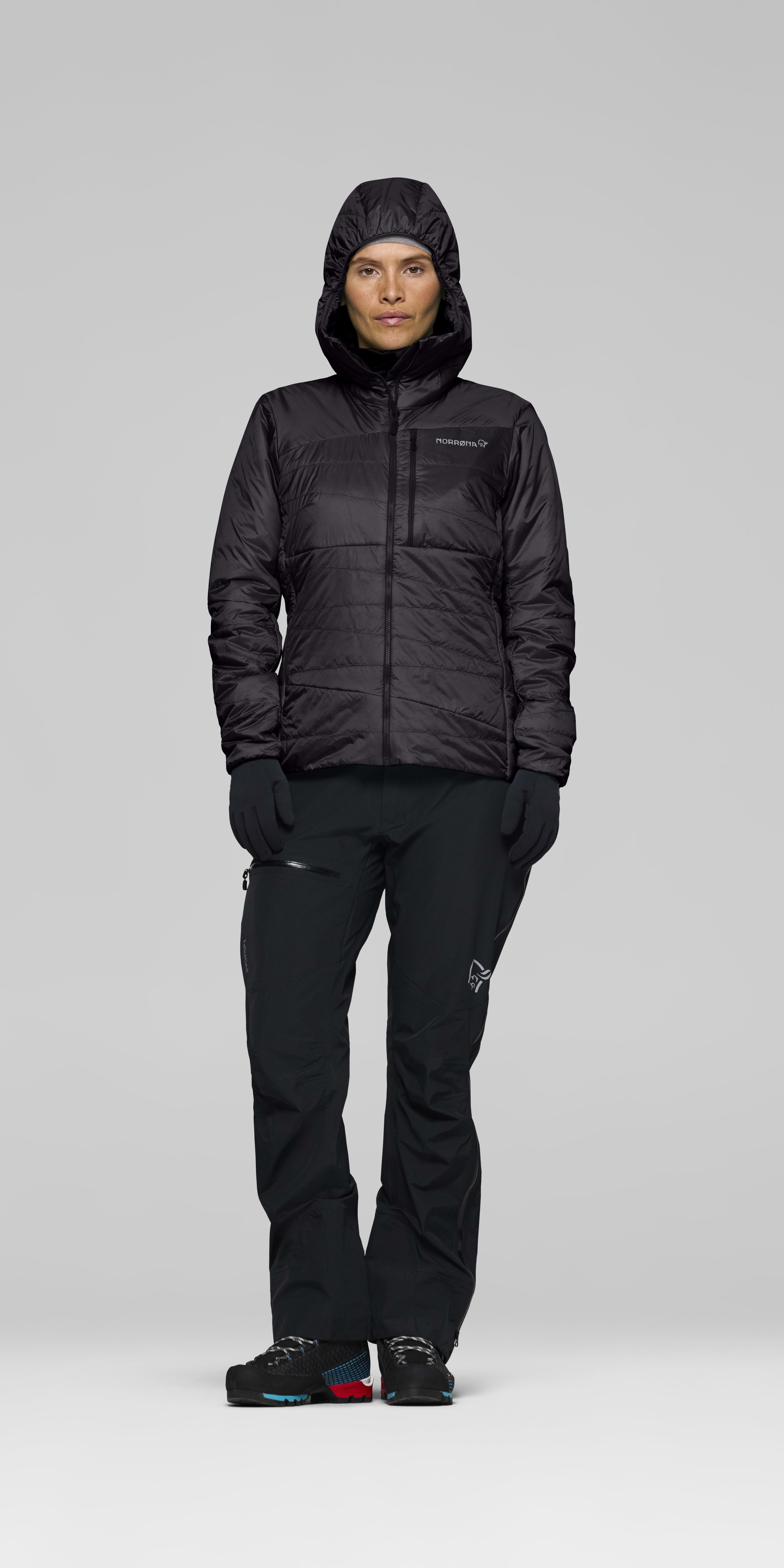 Female Look front image of falketind thermo40 Zip Hood Caviar Black