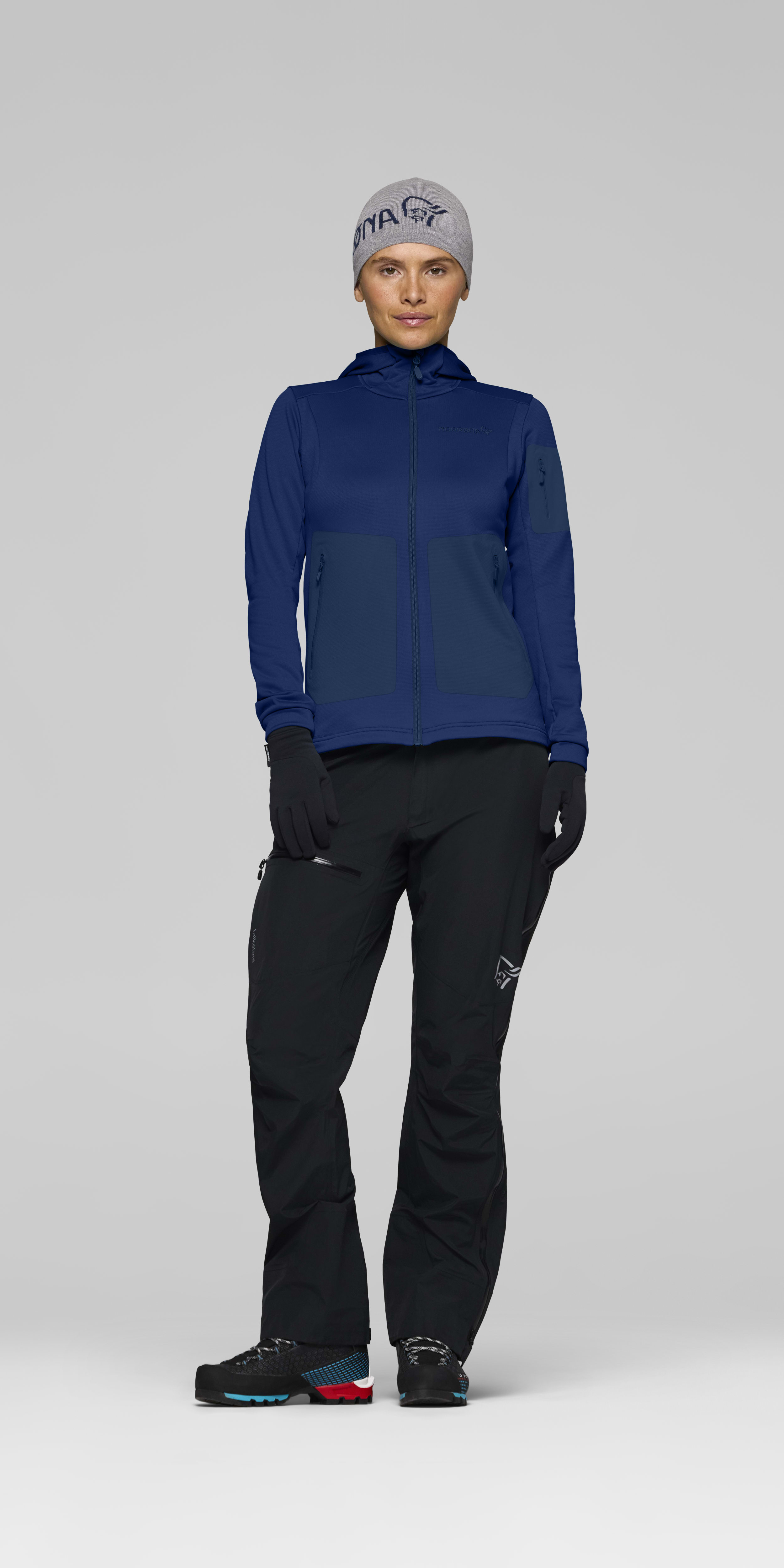 Female Look front image of falketind warm2 stretch Hood Indigo Night