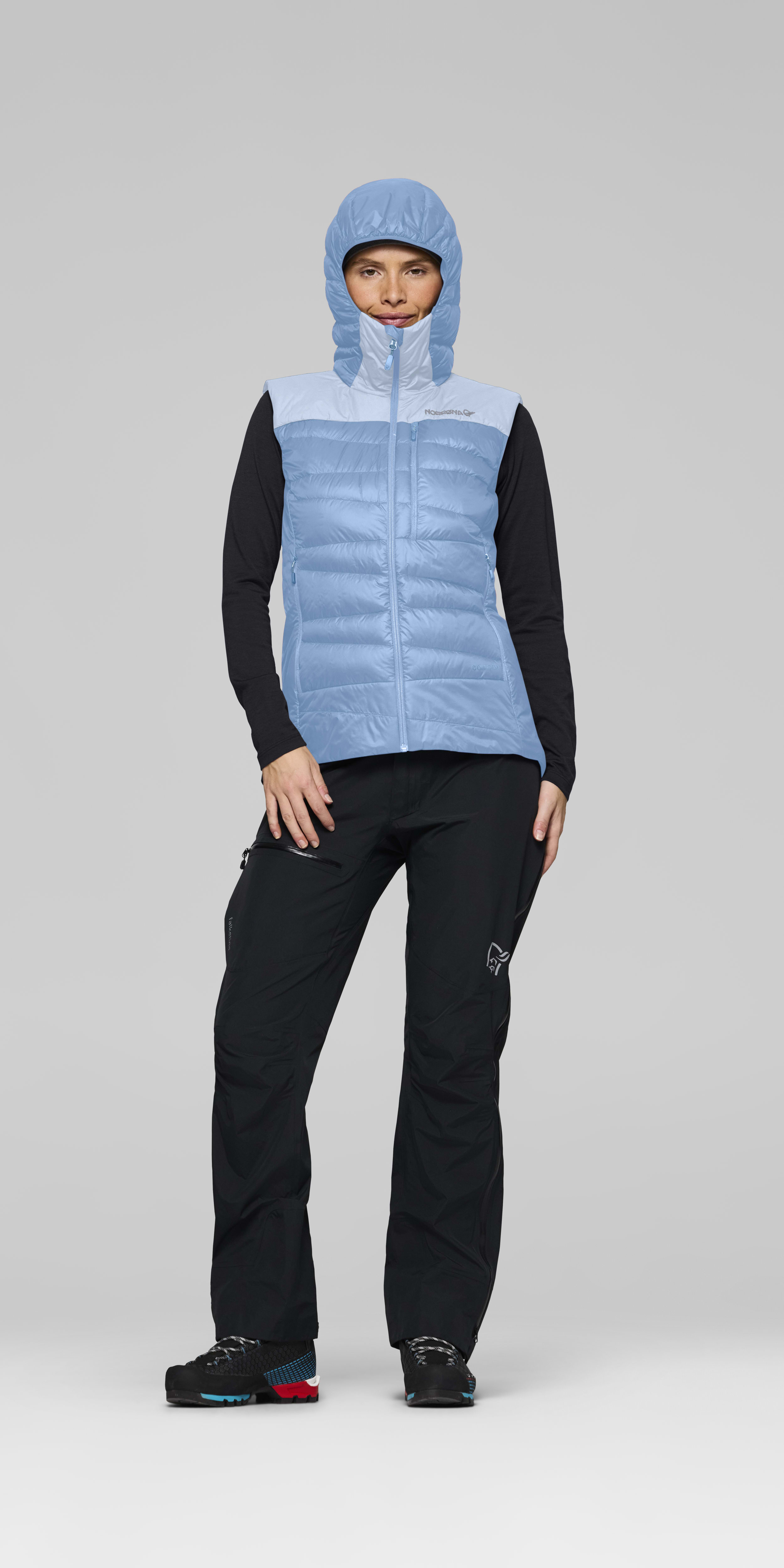 Female Look front image of falketind down750 Vest Allure/Cashmere Blue