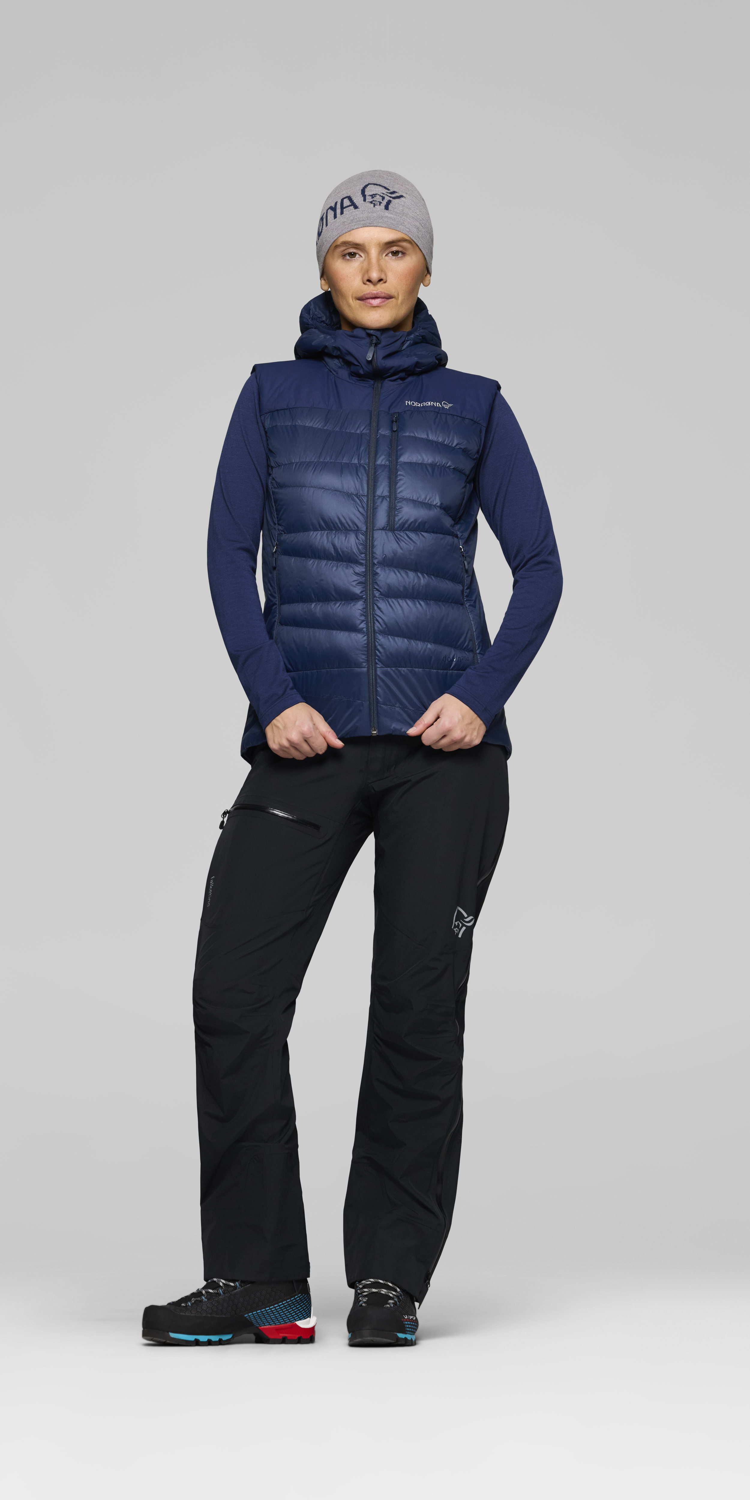 Female Look opening image of falketind down750 Vest Indigo Night