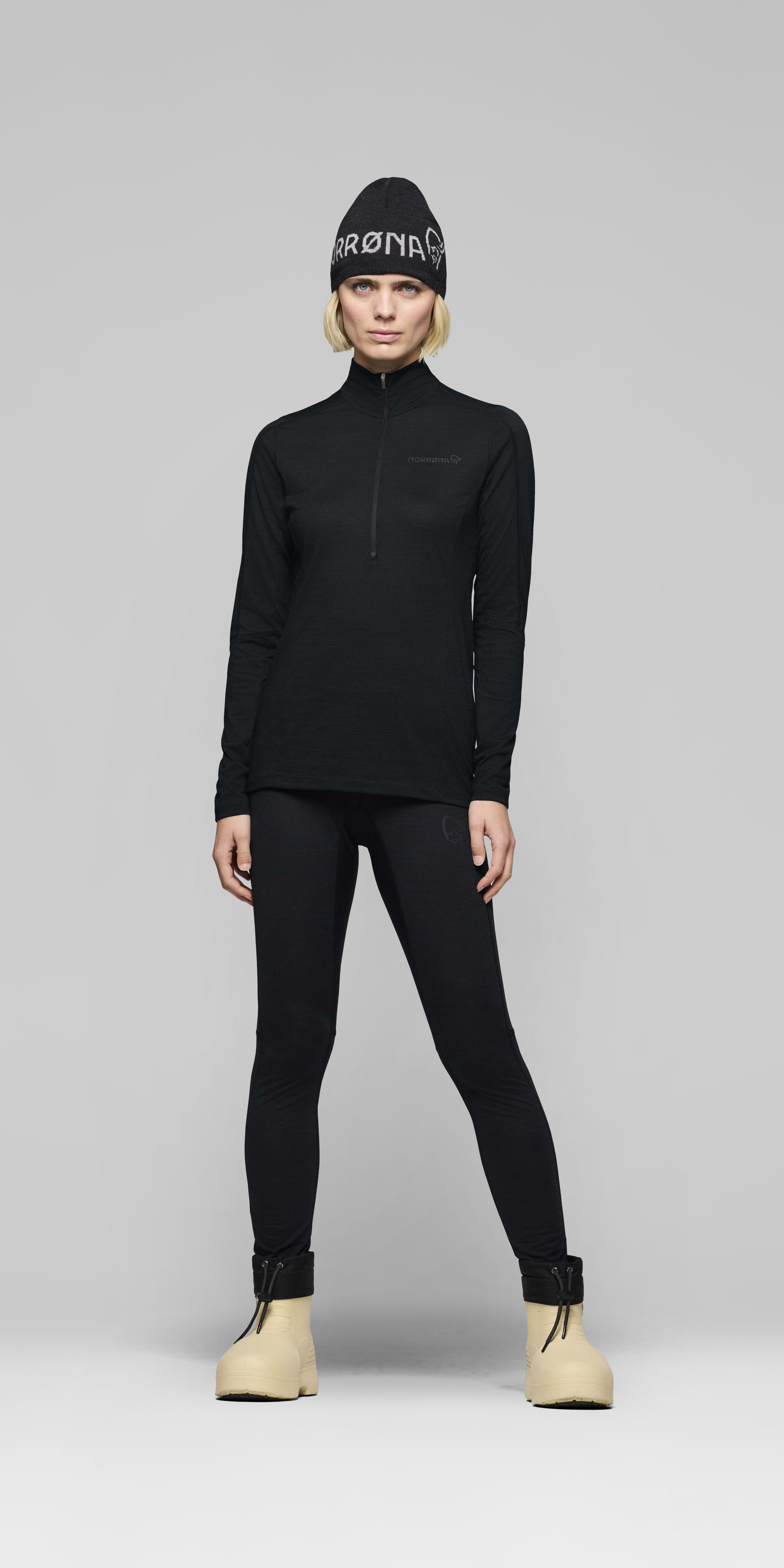 Female Look front image of falketind equaliserUll Zip Neck Caviar Black