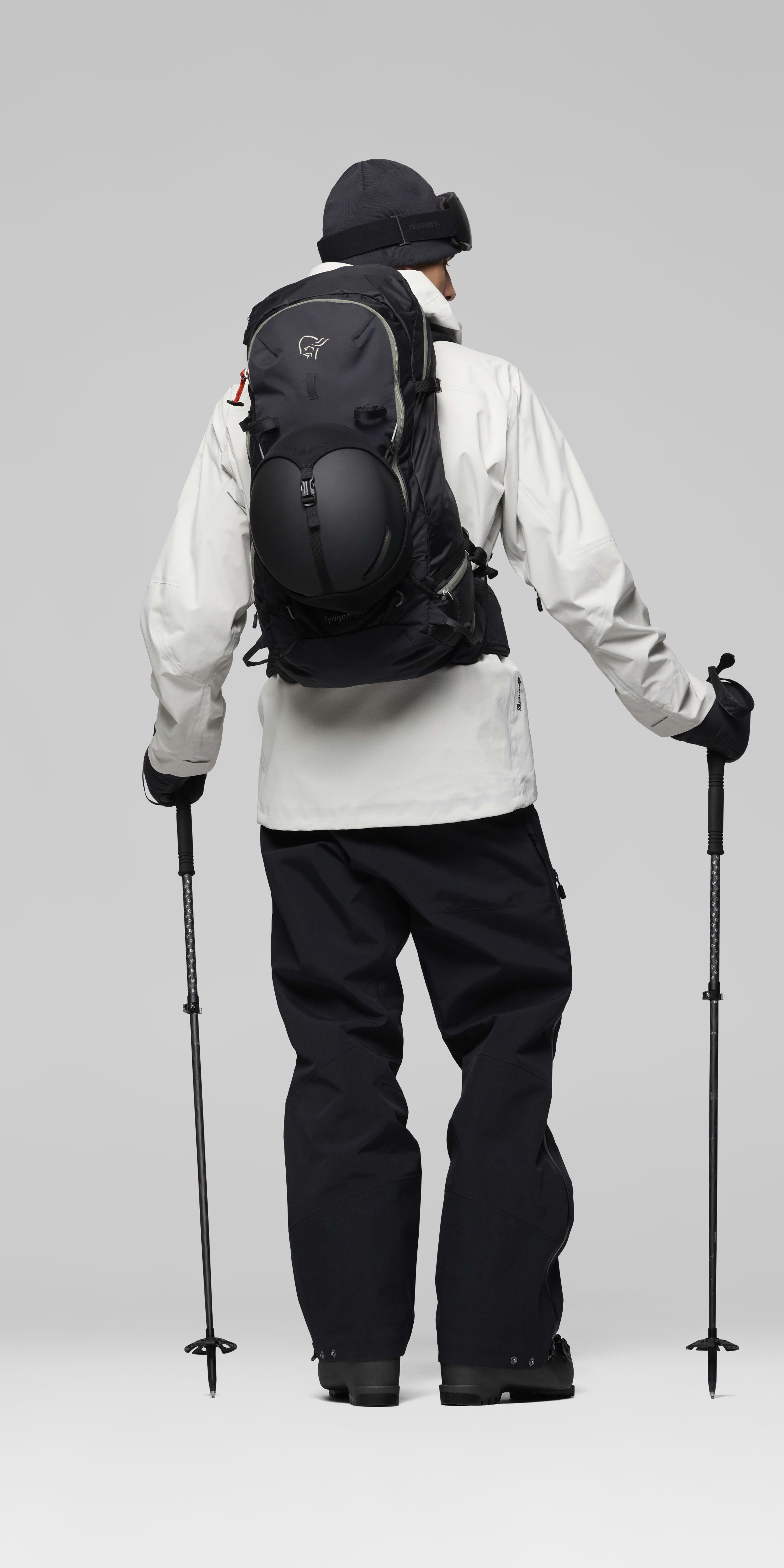 Female Look opening image of lyngen meshBack 40L Pack Caviar Black