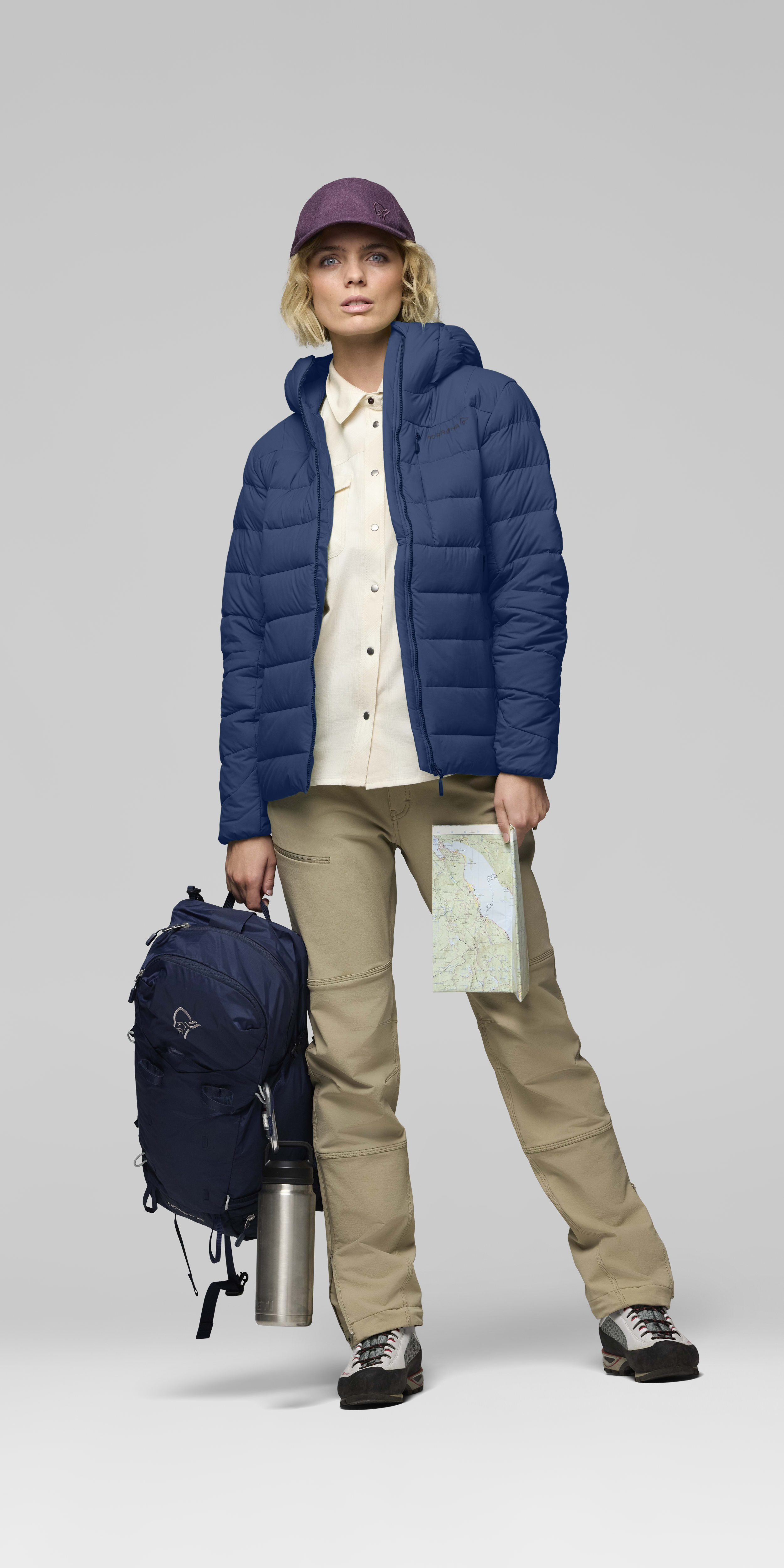 Female Look opening image of femund down700 Zip Hood Indigo Night