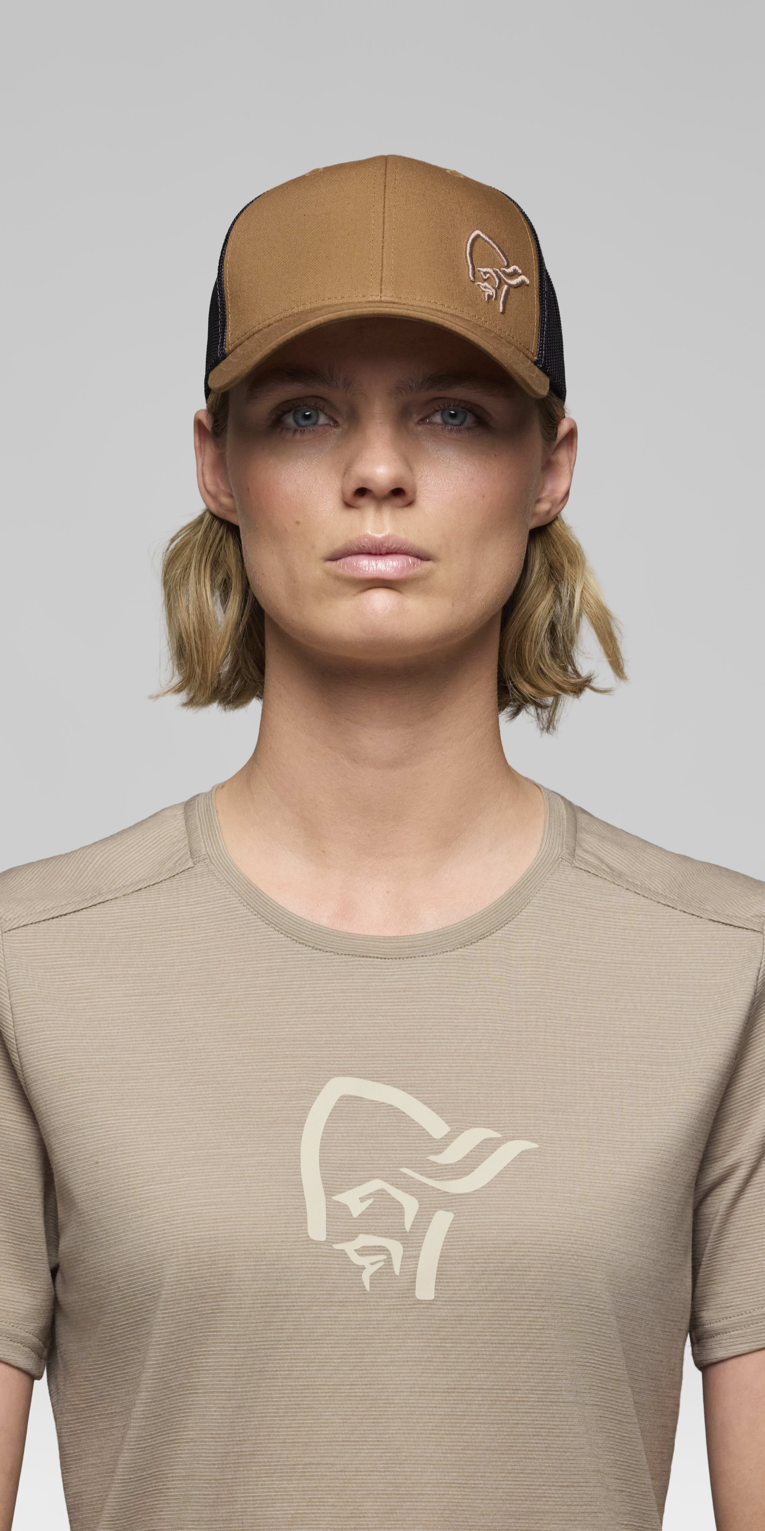 Female Look front image of 29 snap back trucker mesh Cap Camelflage