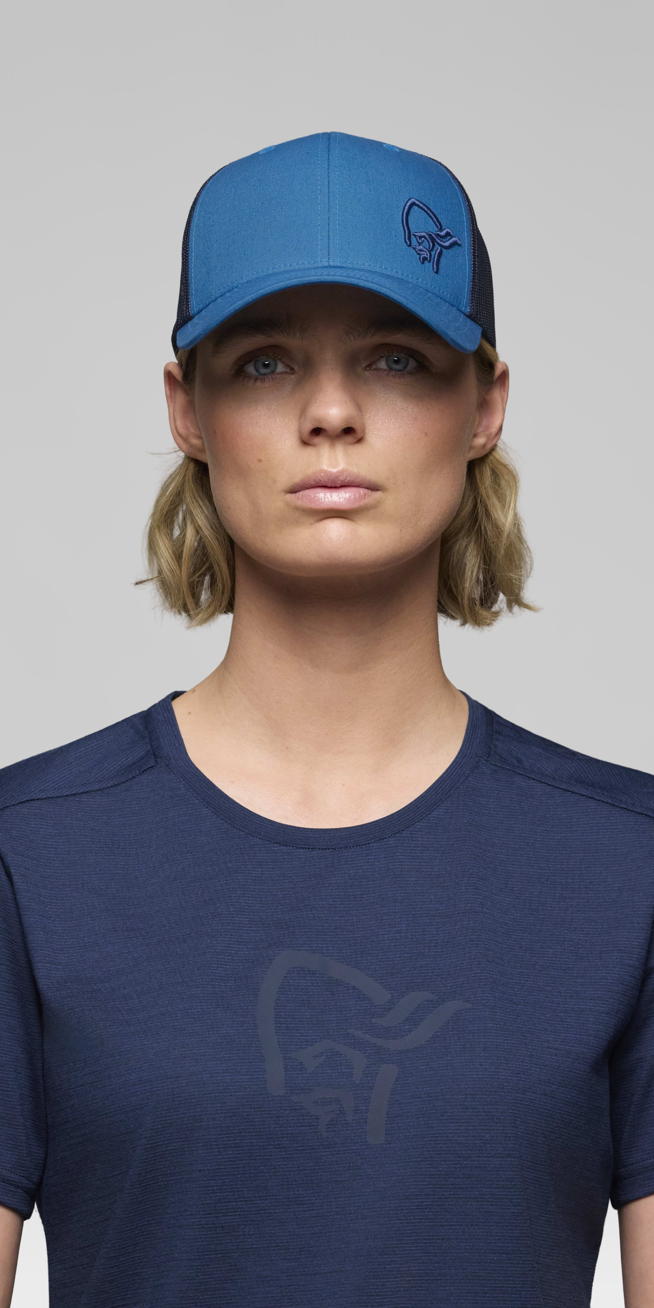 Female Look front image of 29 snap back trucker mesh Cap Brilliant Blue