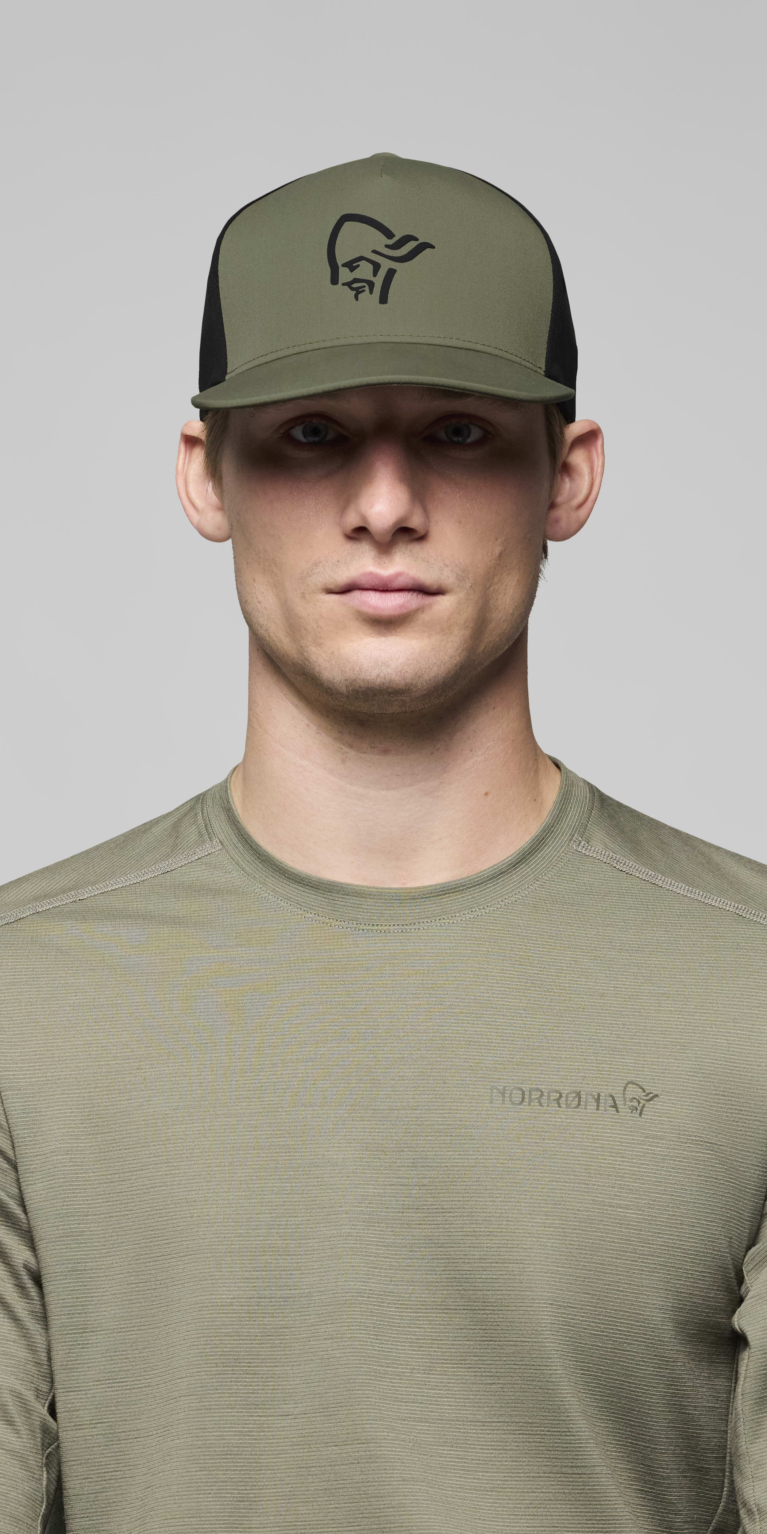 Female Look front image of 29 tech trucker Cap Loden Green
