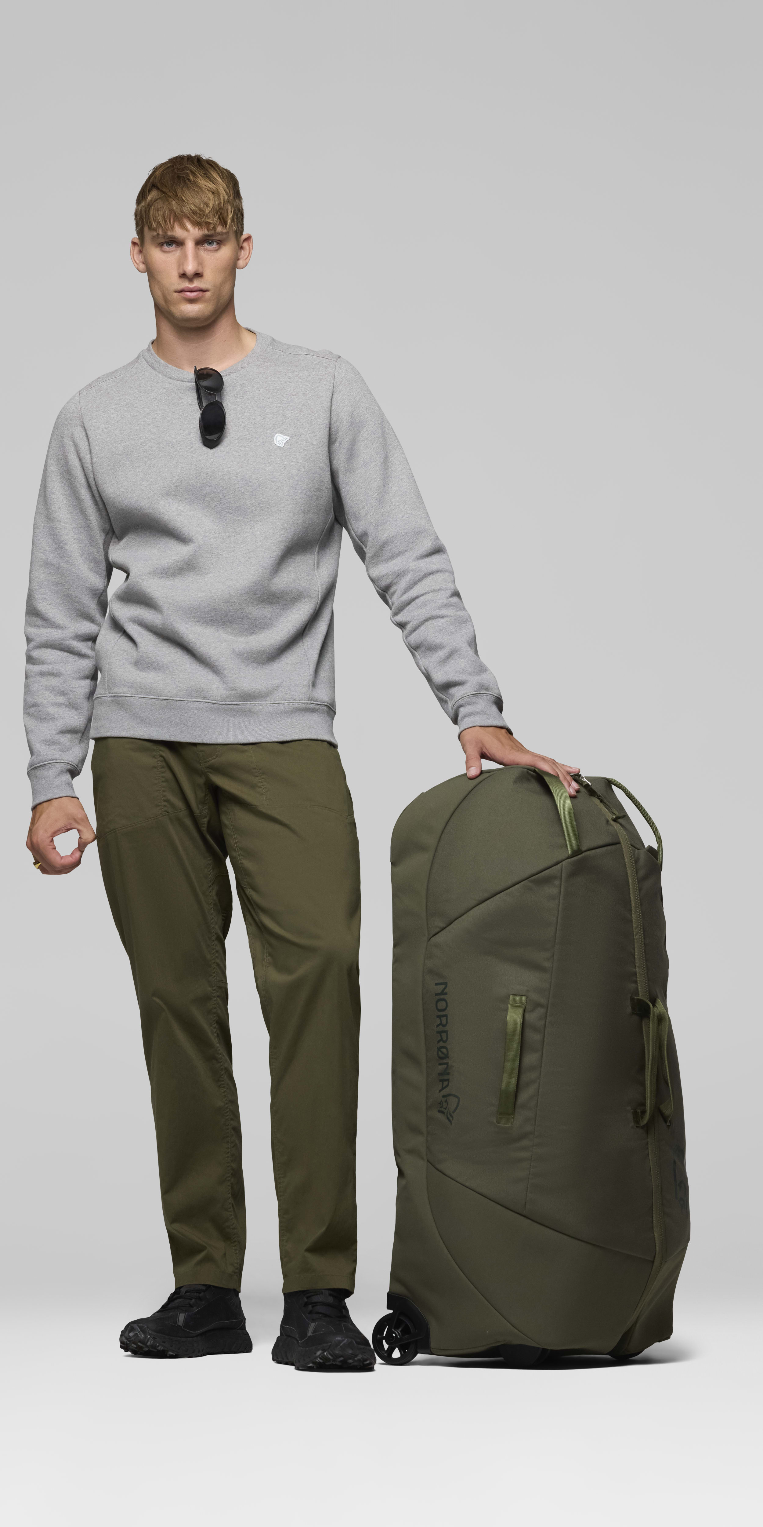 Female Look front image of norrona dividable 125L Trolley Bag Olive Night