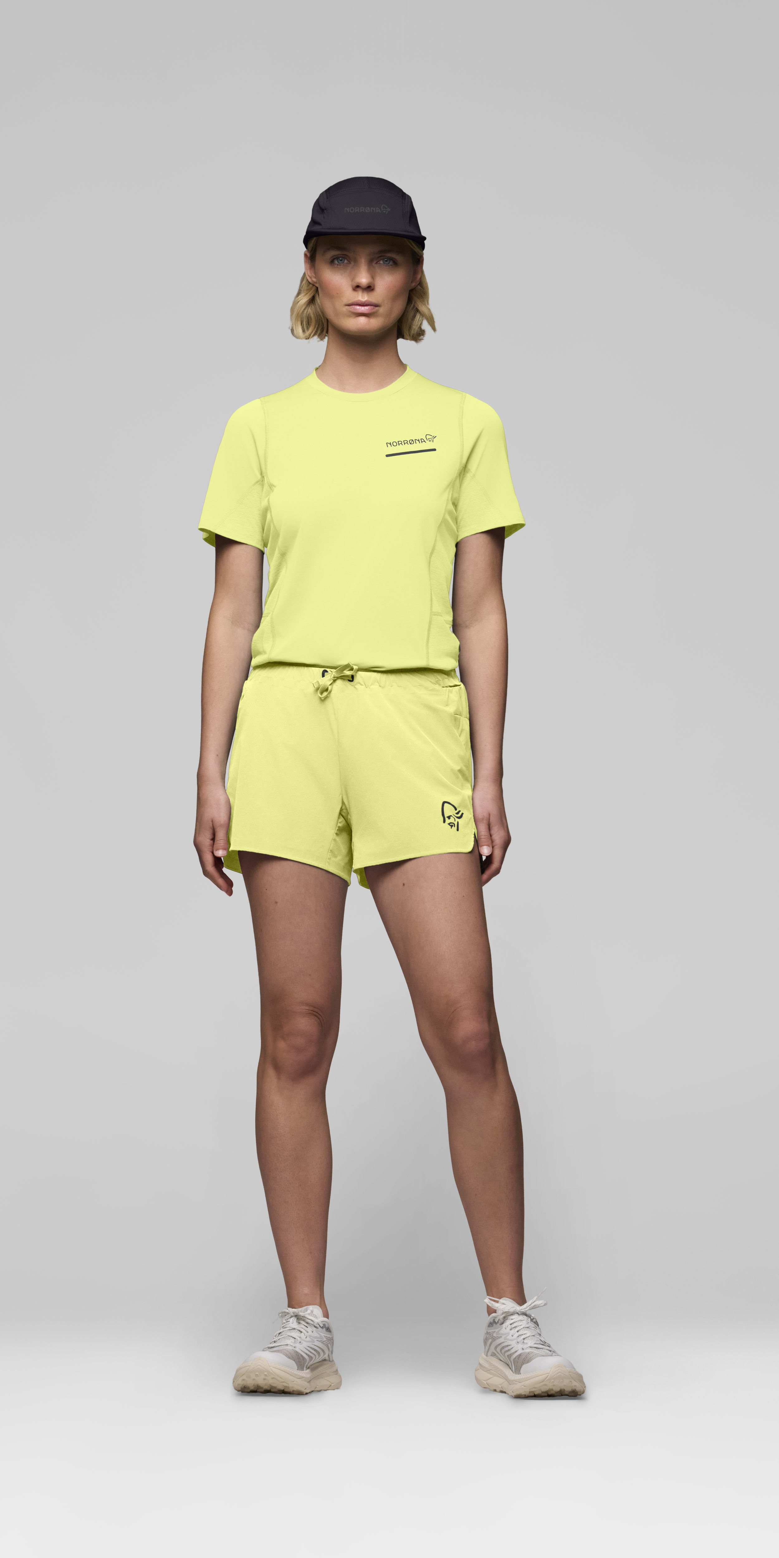 Female Look front image of senja flex1 4" Shorts Limeade